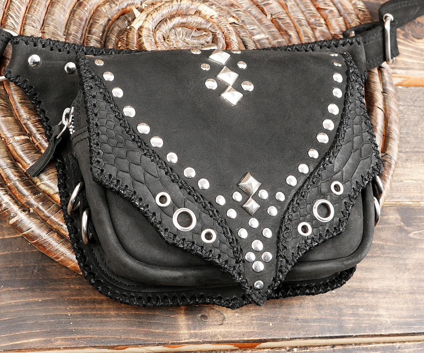 Artisan leather waist bag with decorative rivets