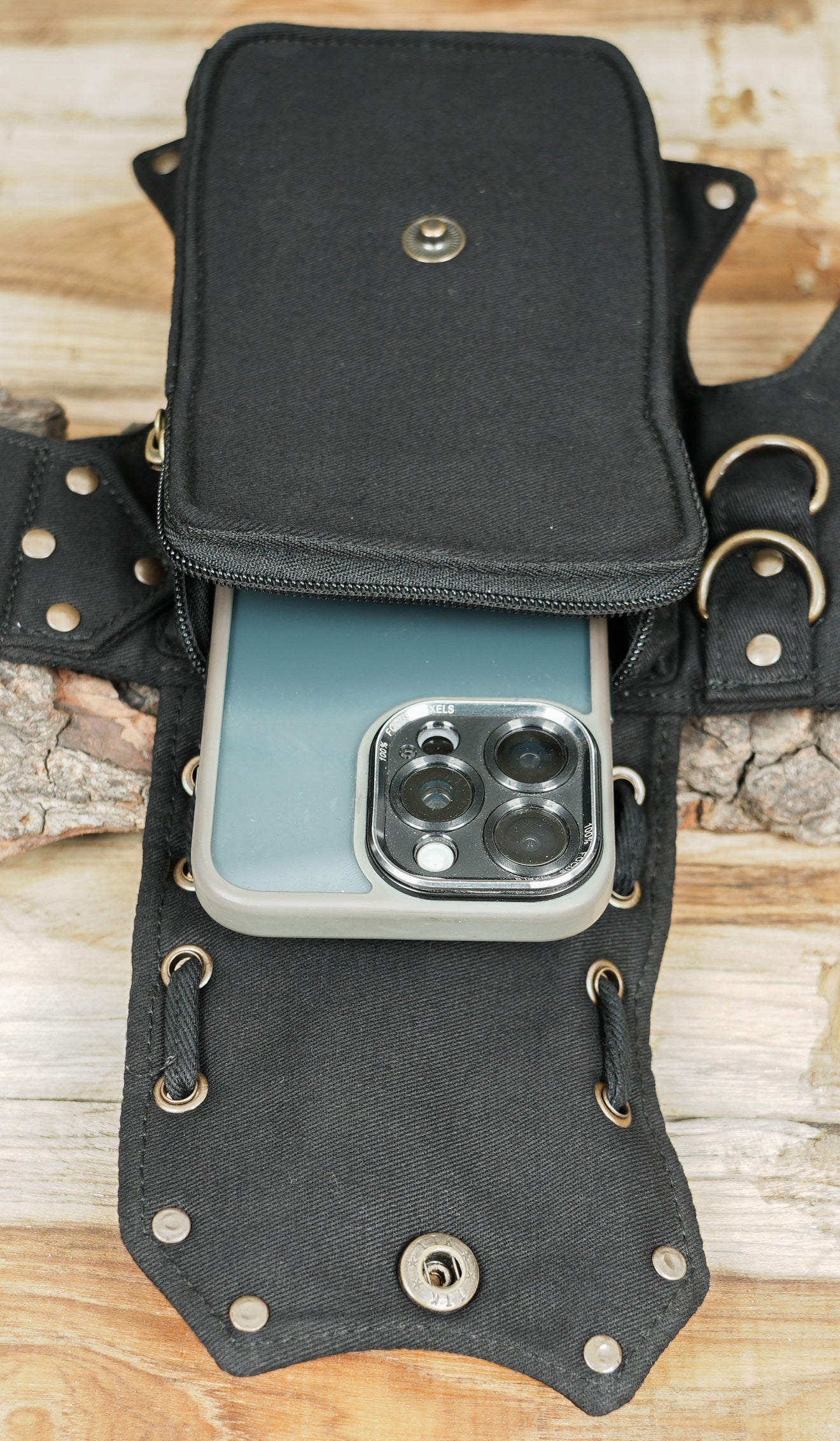 Tribal gothic pocket belt with side key clasp and studded pointed flap details