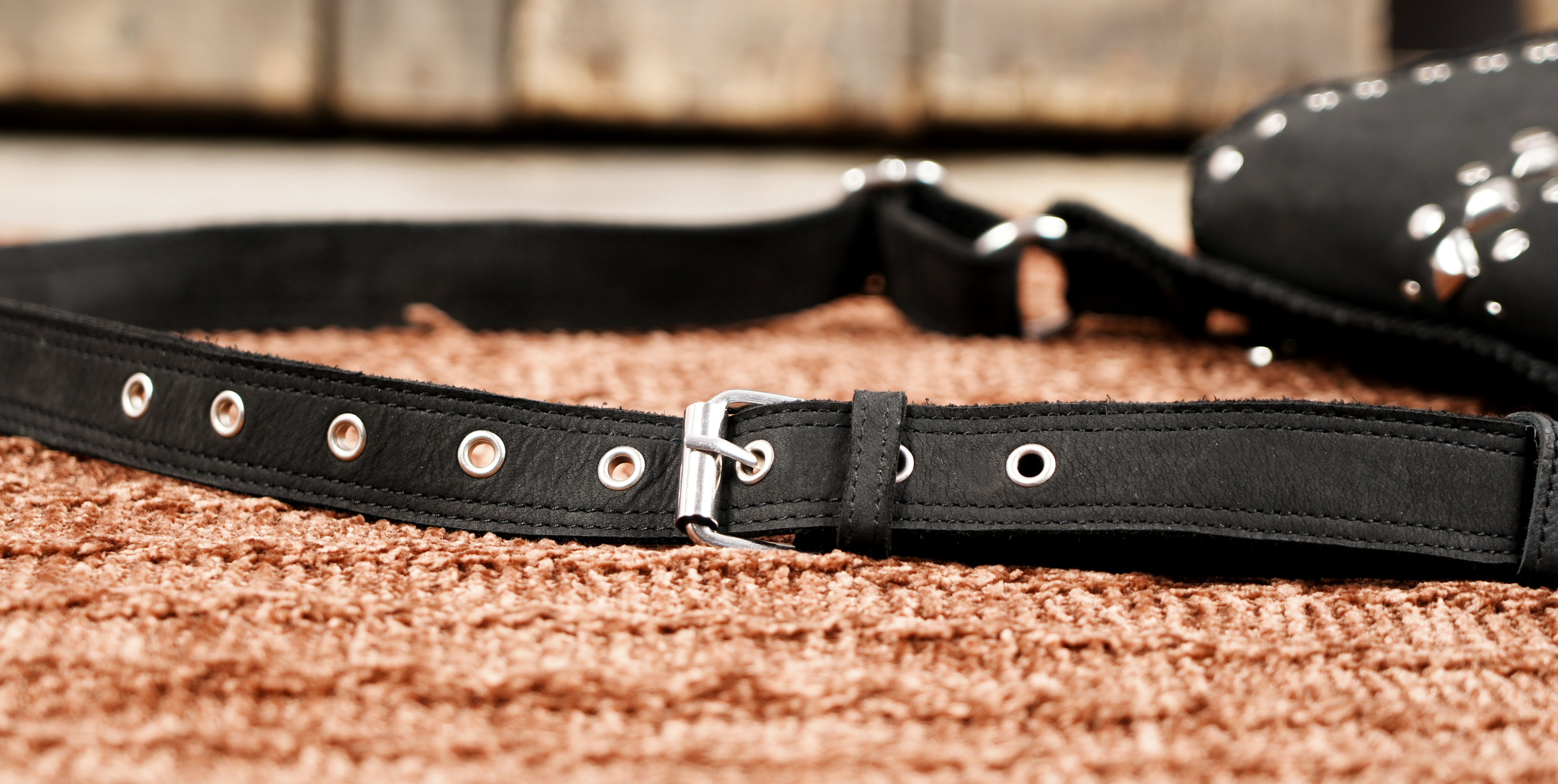 Black utility waist pouch with detailed stitching