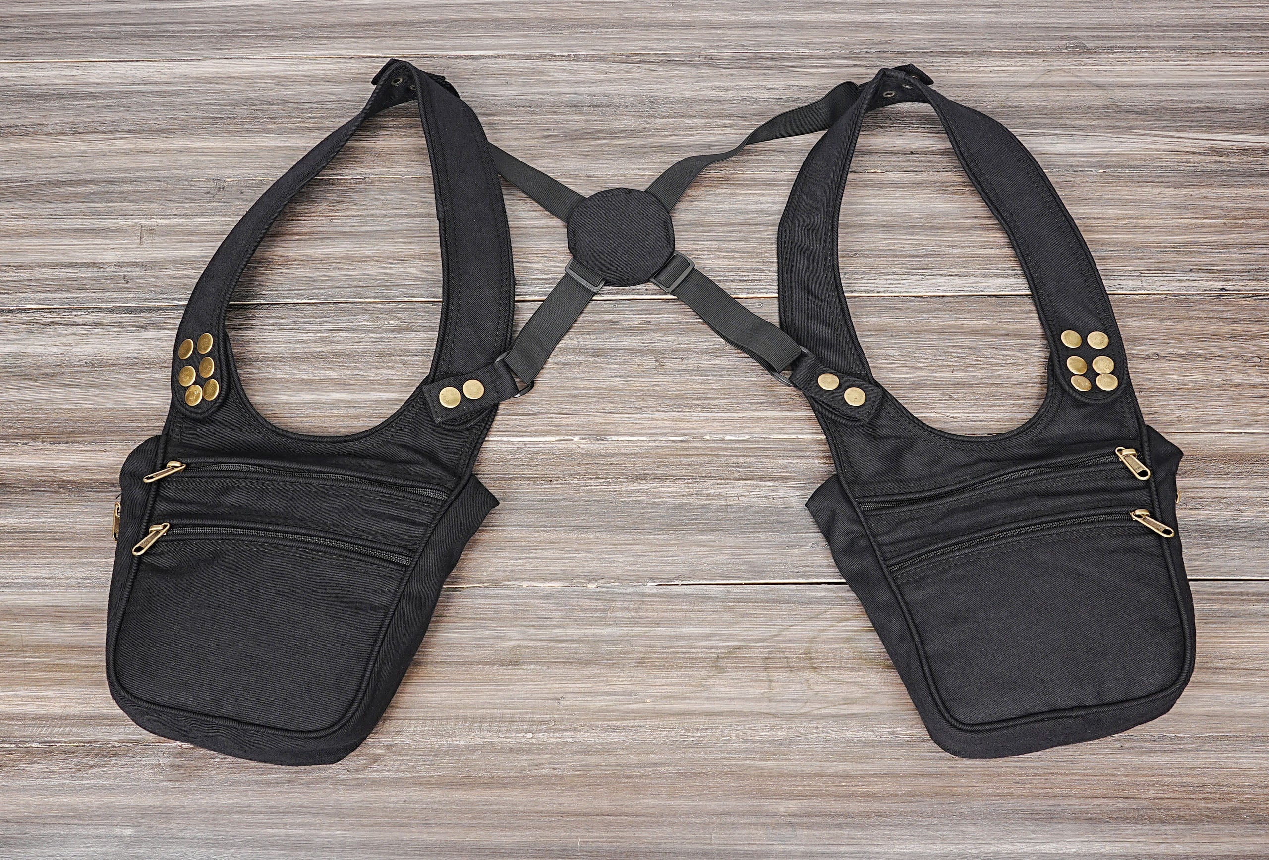 Black cotton canvas double shoulder harness bag with brass buttons