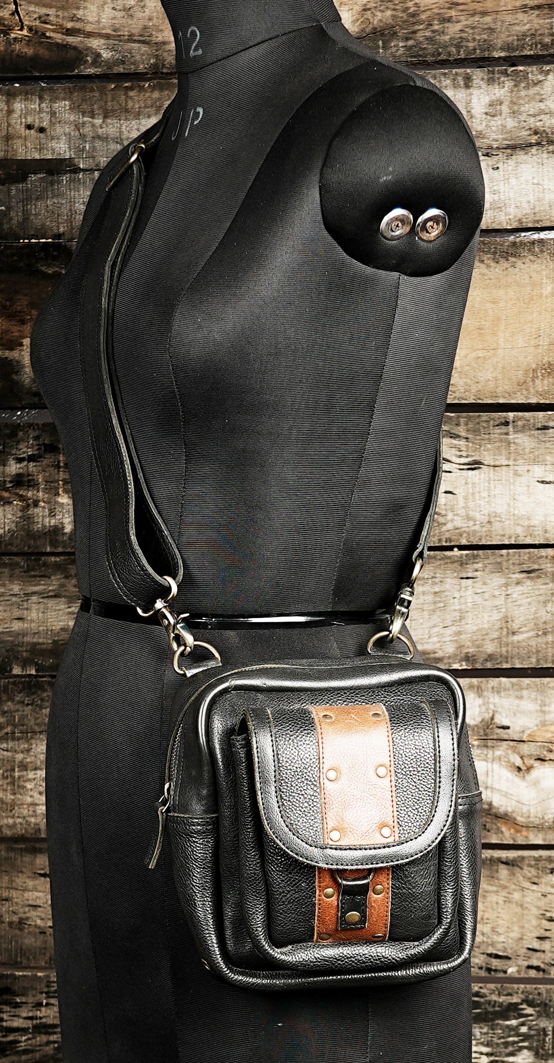 Hand stitched leather waist pouch with metal hardware