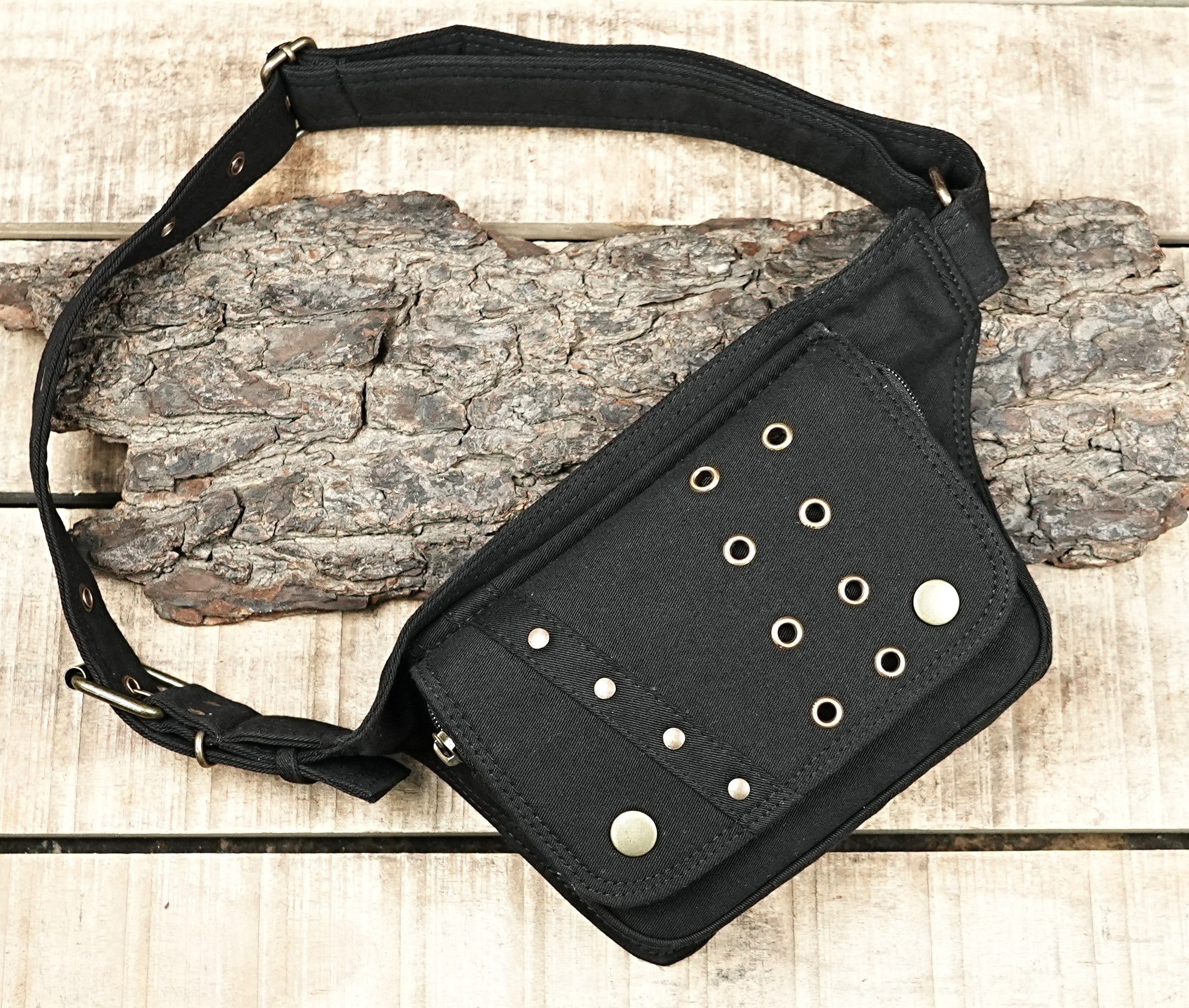 Gothic-style black canvas pouch belt with metal eyelets and rivets.