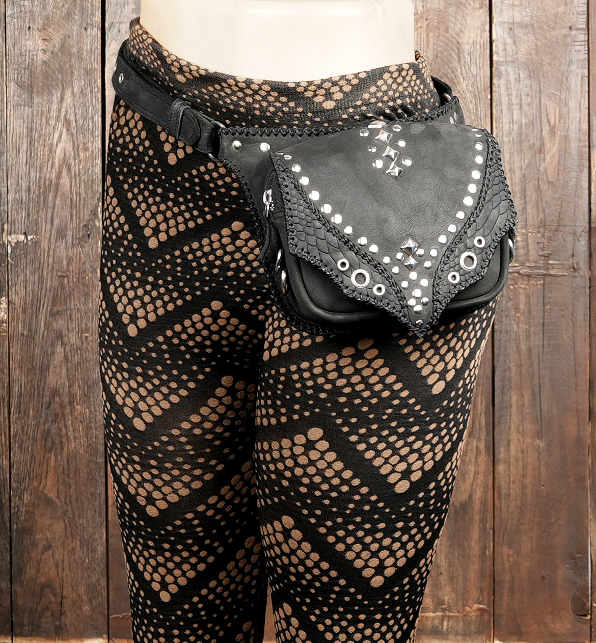 Unisex black leather waist bag with studded details