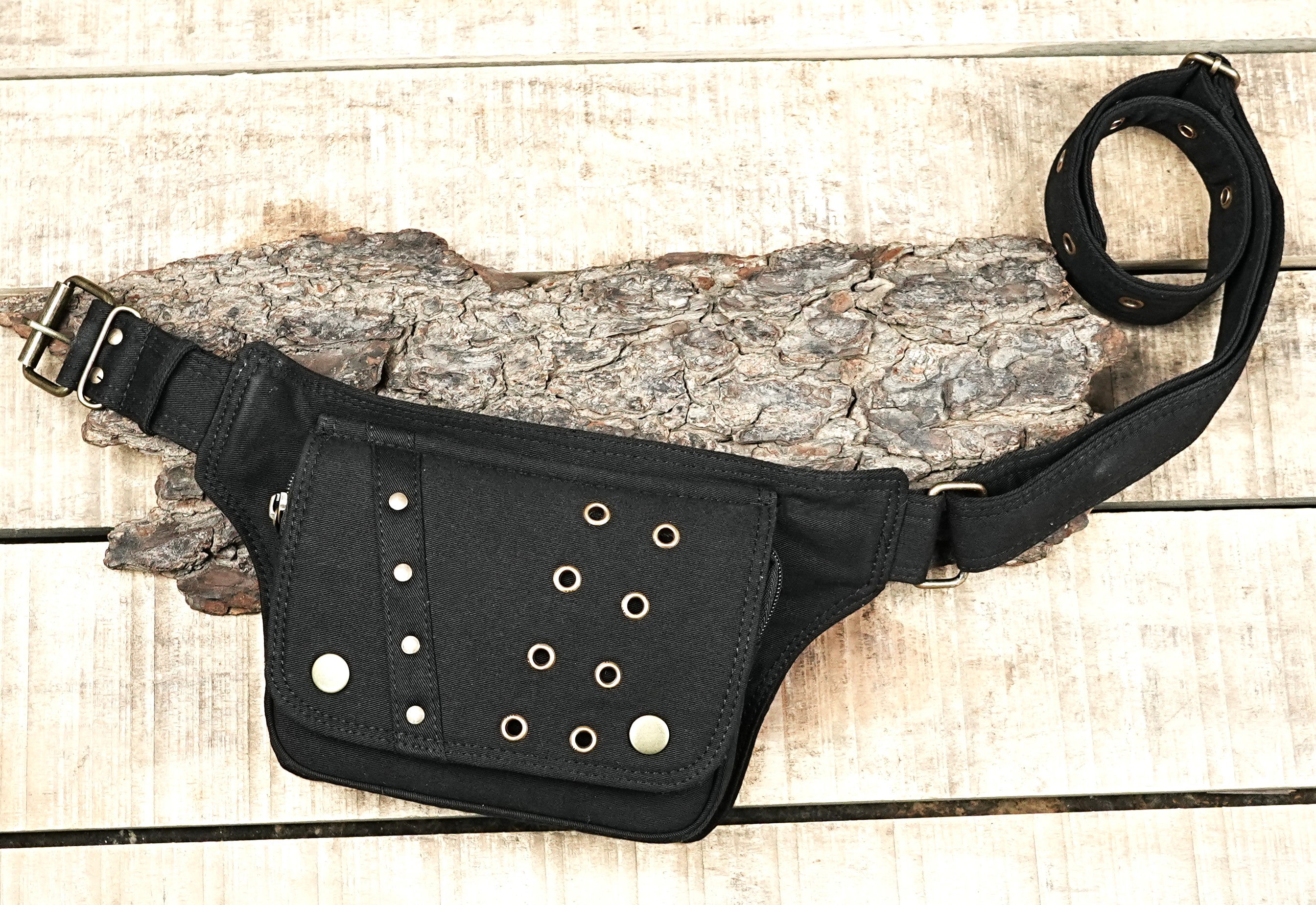 Rock and roll style black hip pouch belt with urban street fashion appeal.