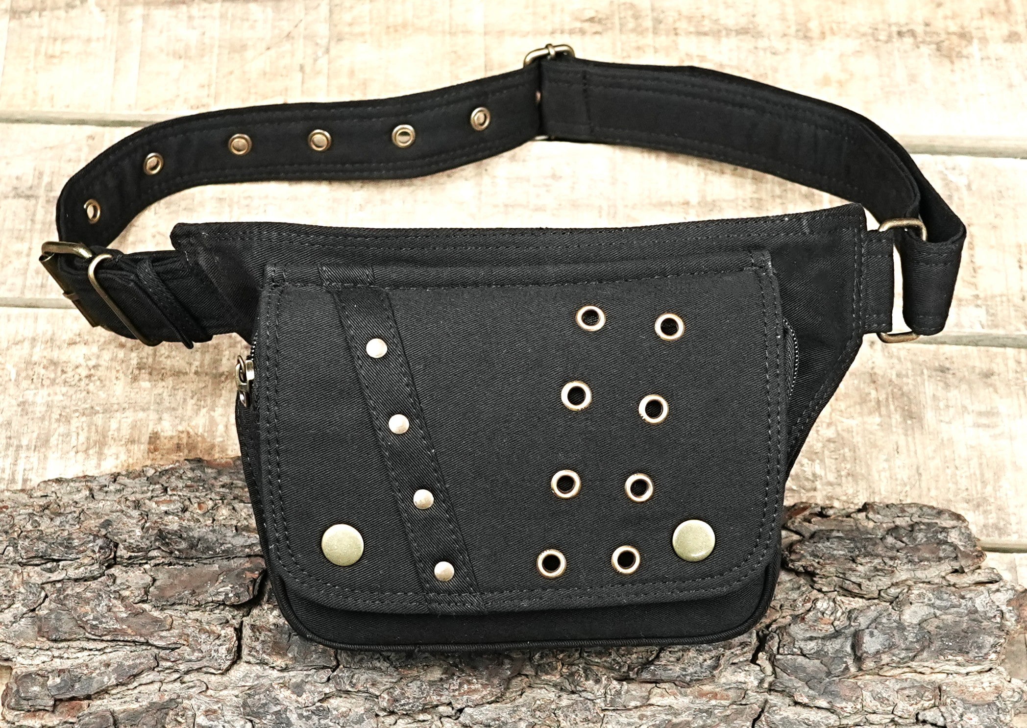 Steampunk adventurer utility belt with one canvas pocket and metal accents.