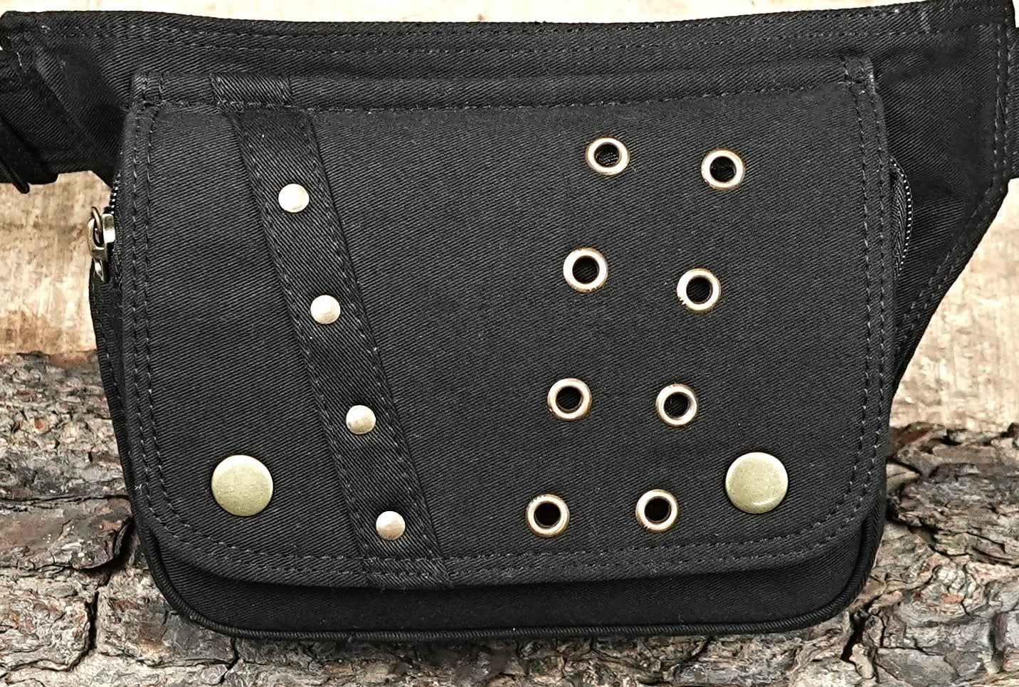 Rugged black multi-purpose pouch belt suitable for festivals and travel.