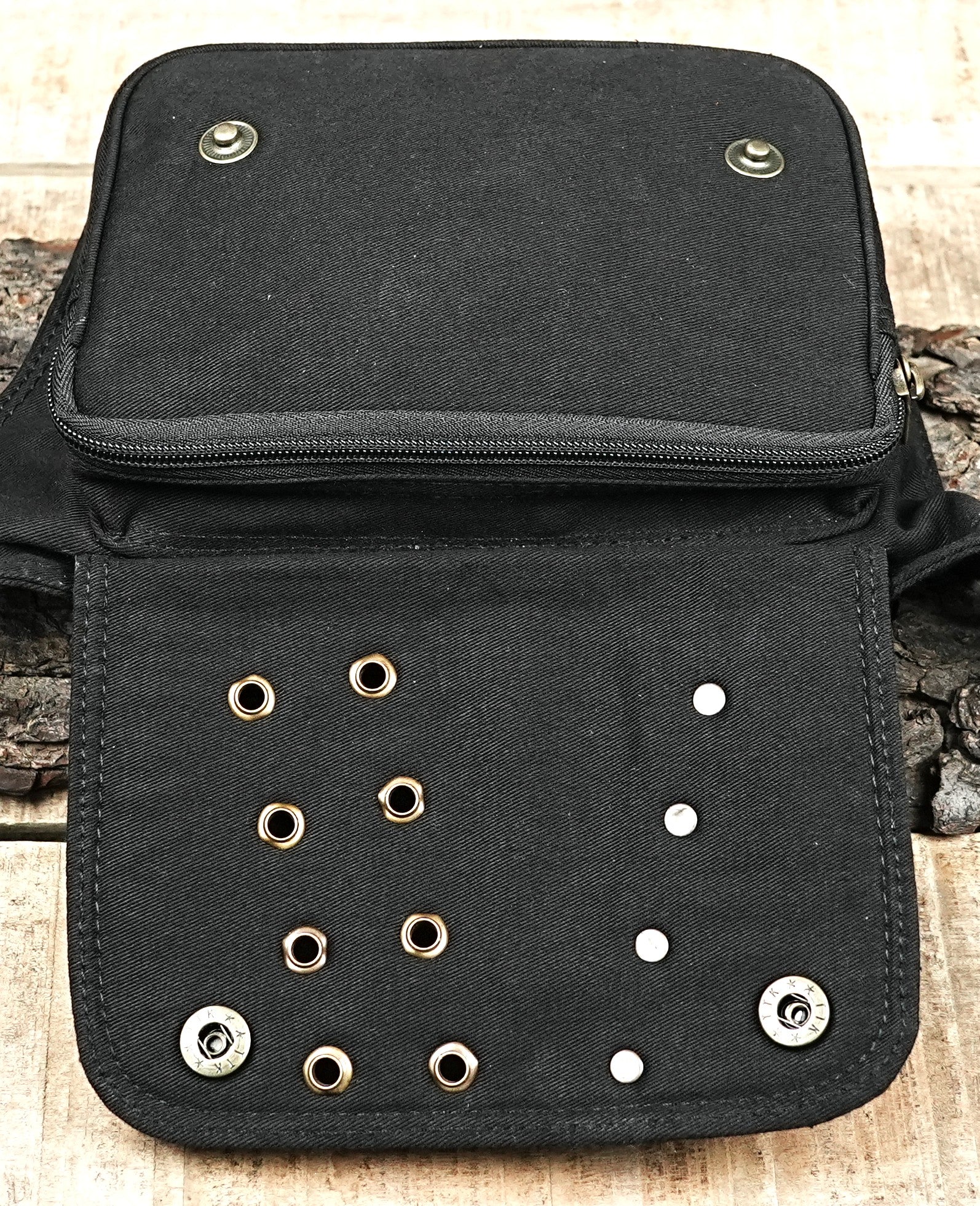Dark alternative fashion black canvas utility belt with adjustable fit.