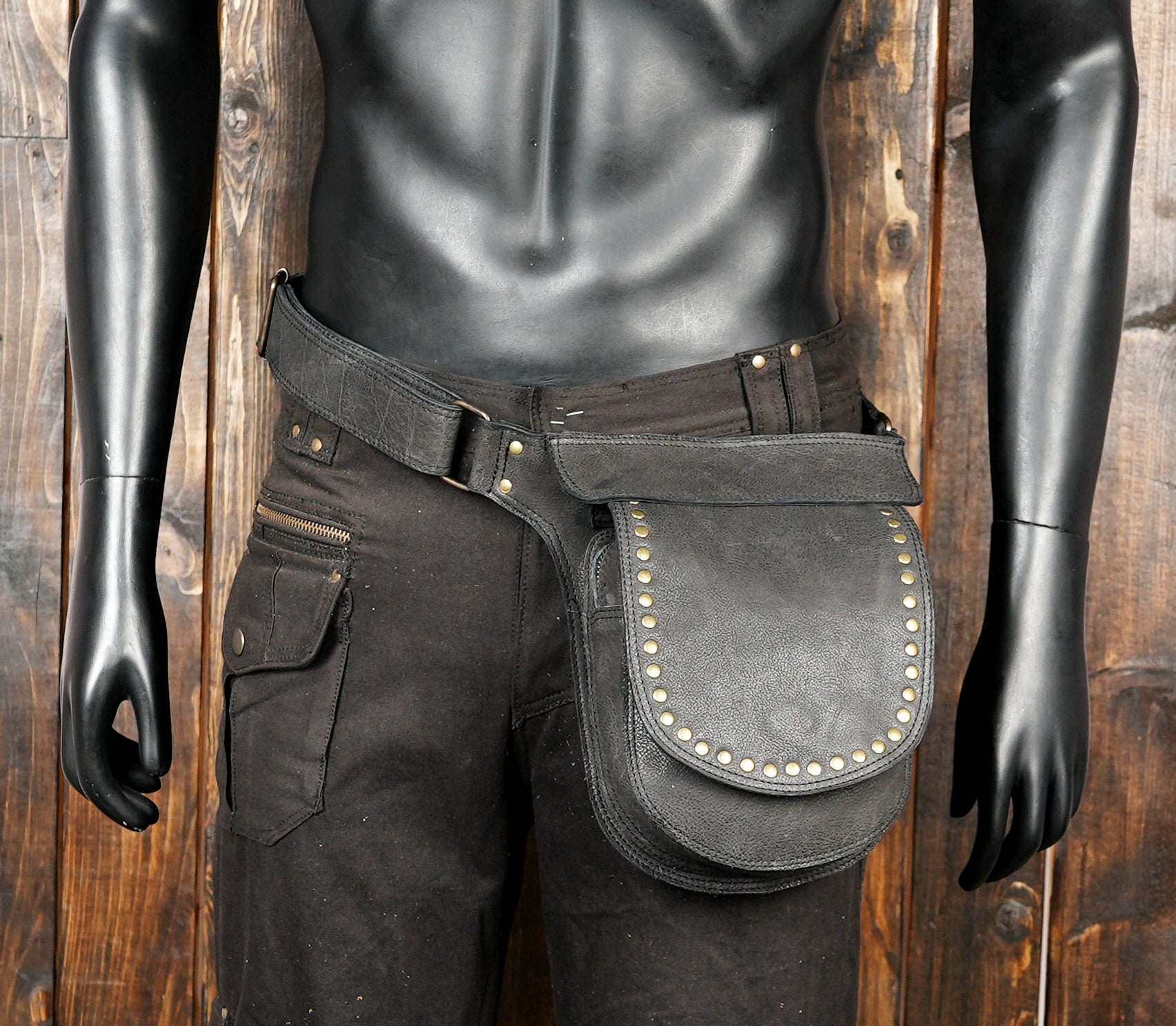 Leather hip belt with handcrafted construction and storage pocket