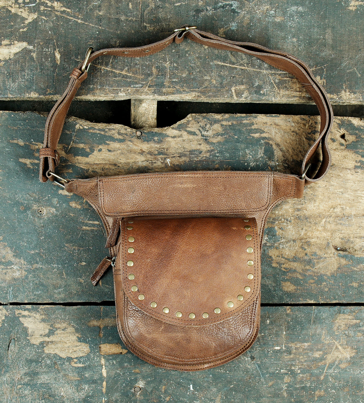 Utility style leather waist belt with front flap pouch