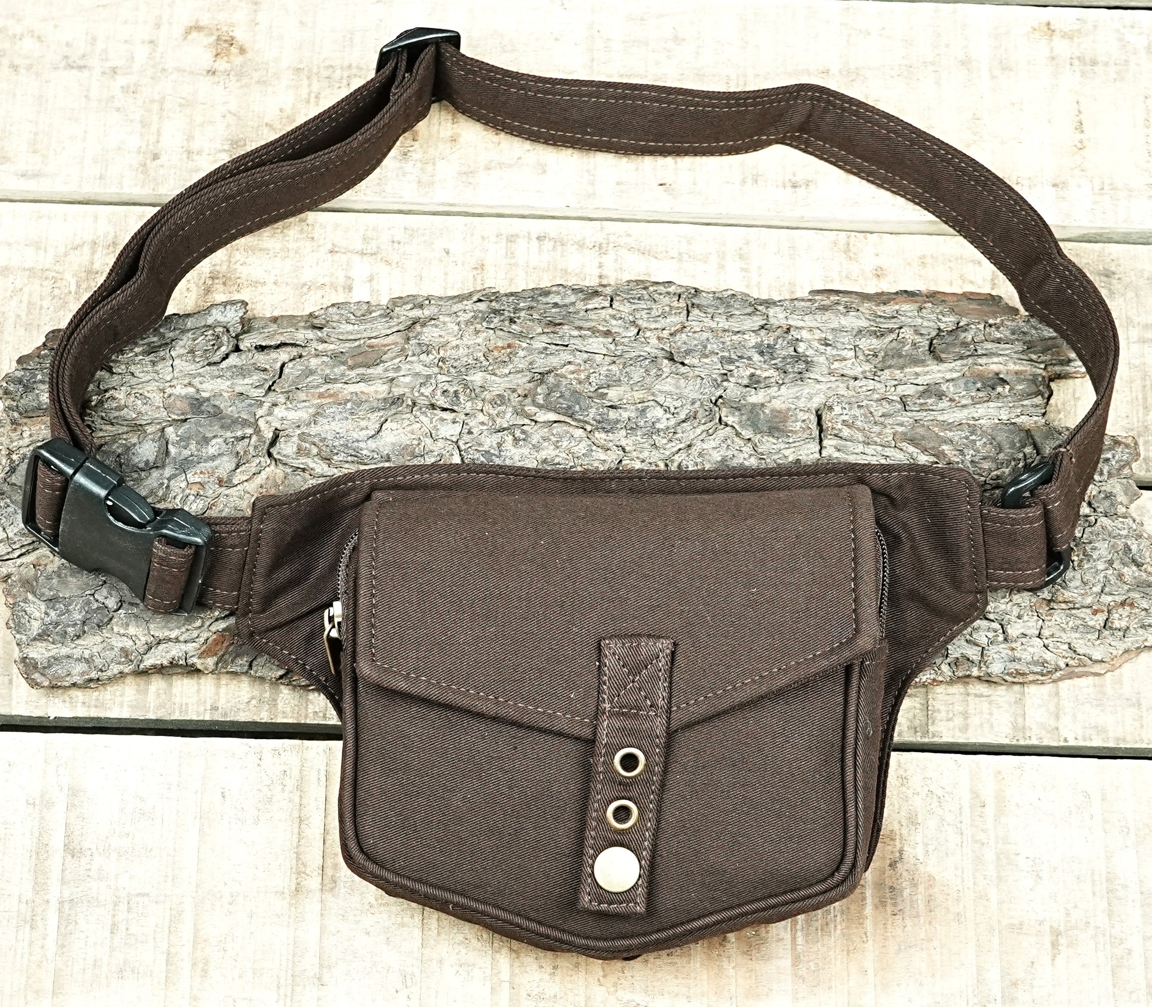 Crossbody sling hip pack in durable canvas with adjustable waist webbing