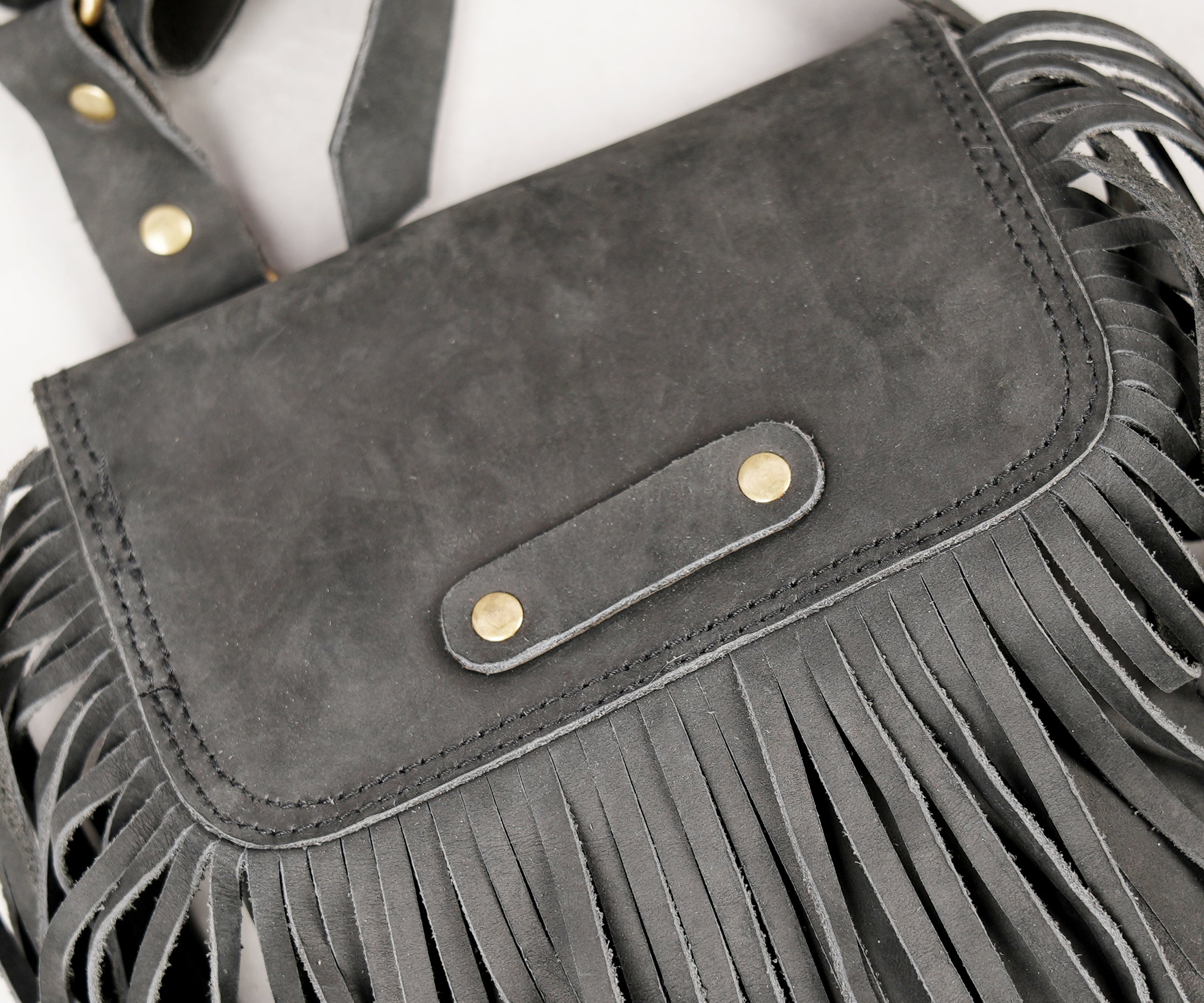 Boho style leather chest rig with long fringe