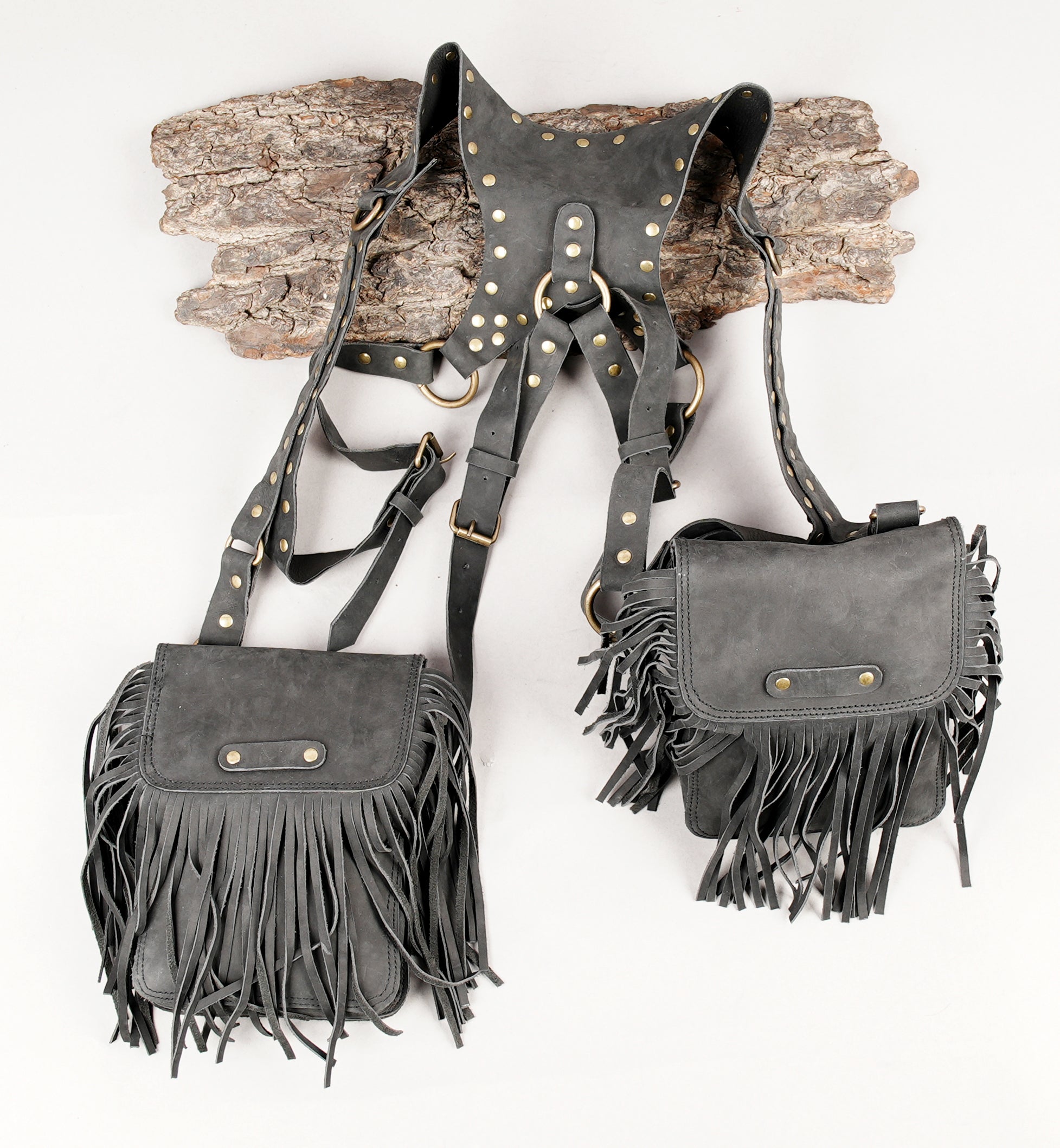 Tribal inspired leather holster with fringe and studs