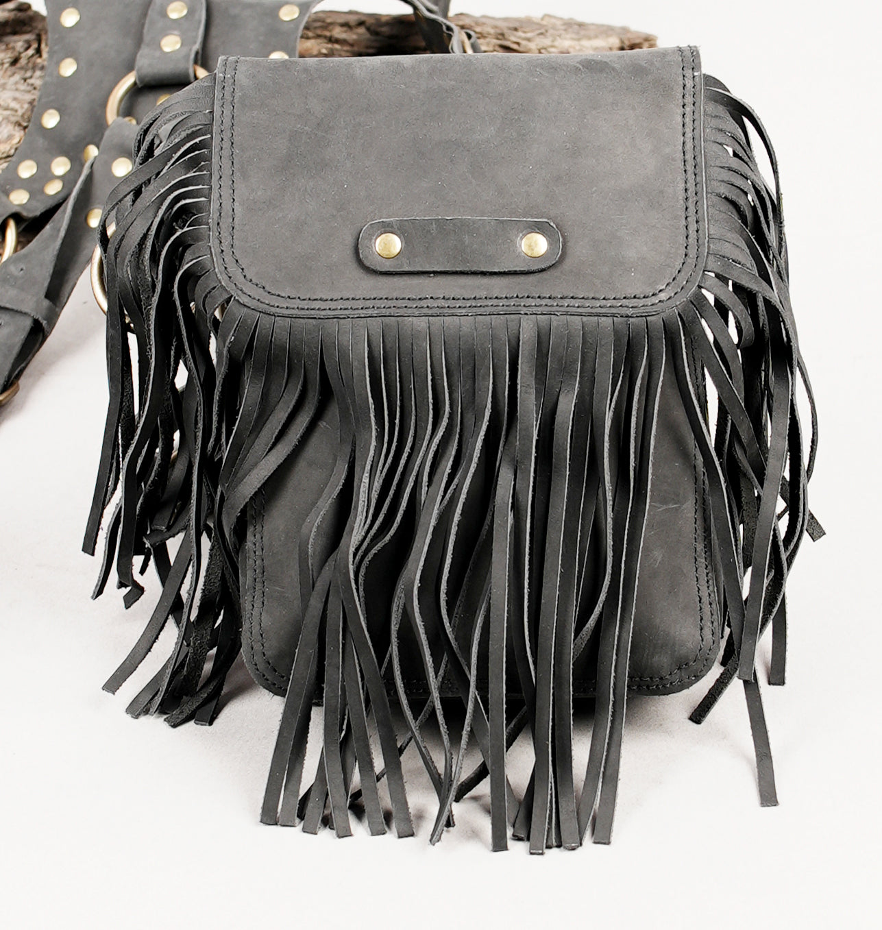 Festival leather holster with decorative fringe design