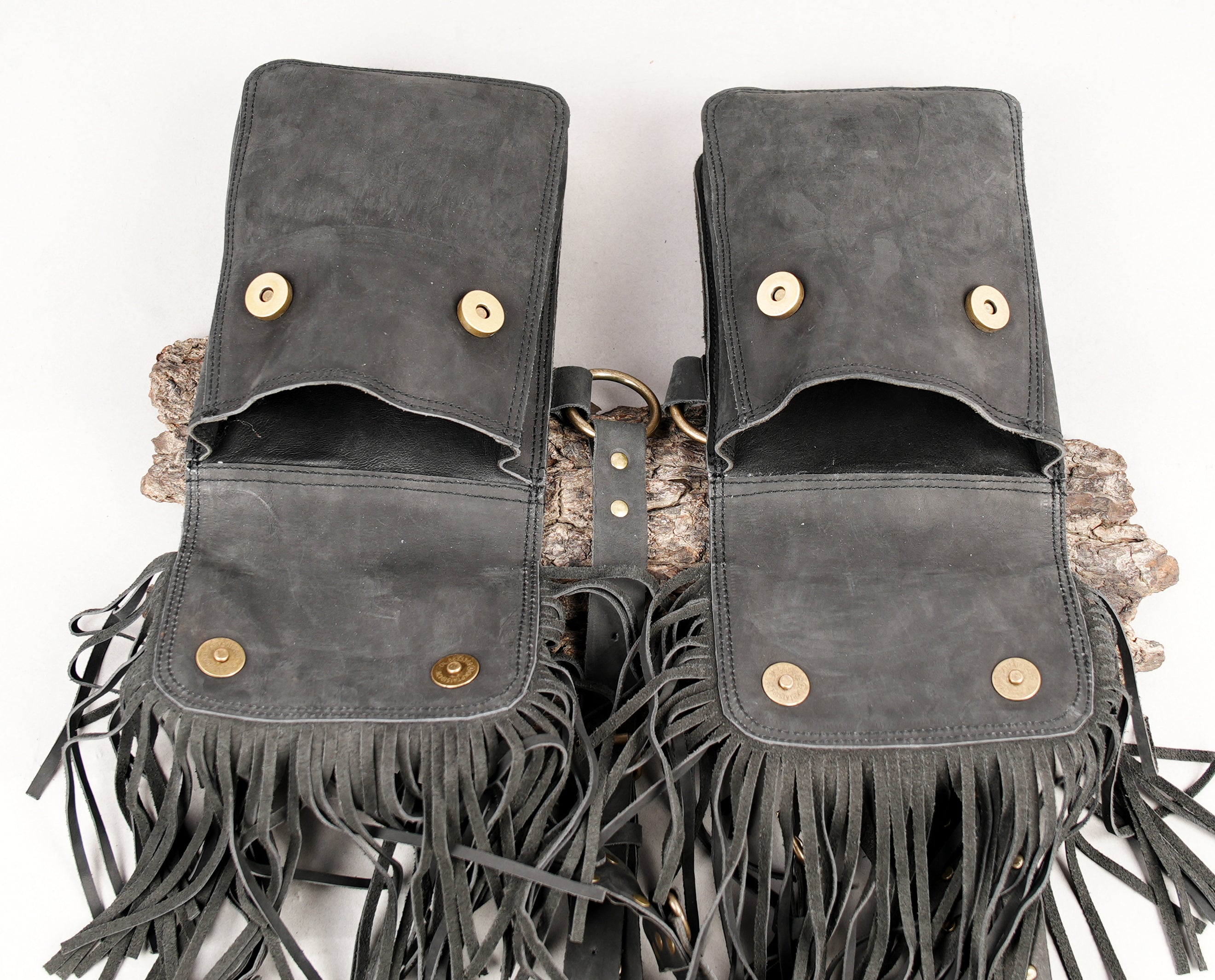 Black leather chest holster with handcrafted detailing