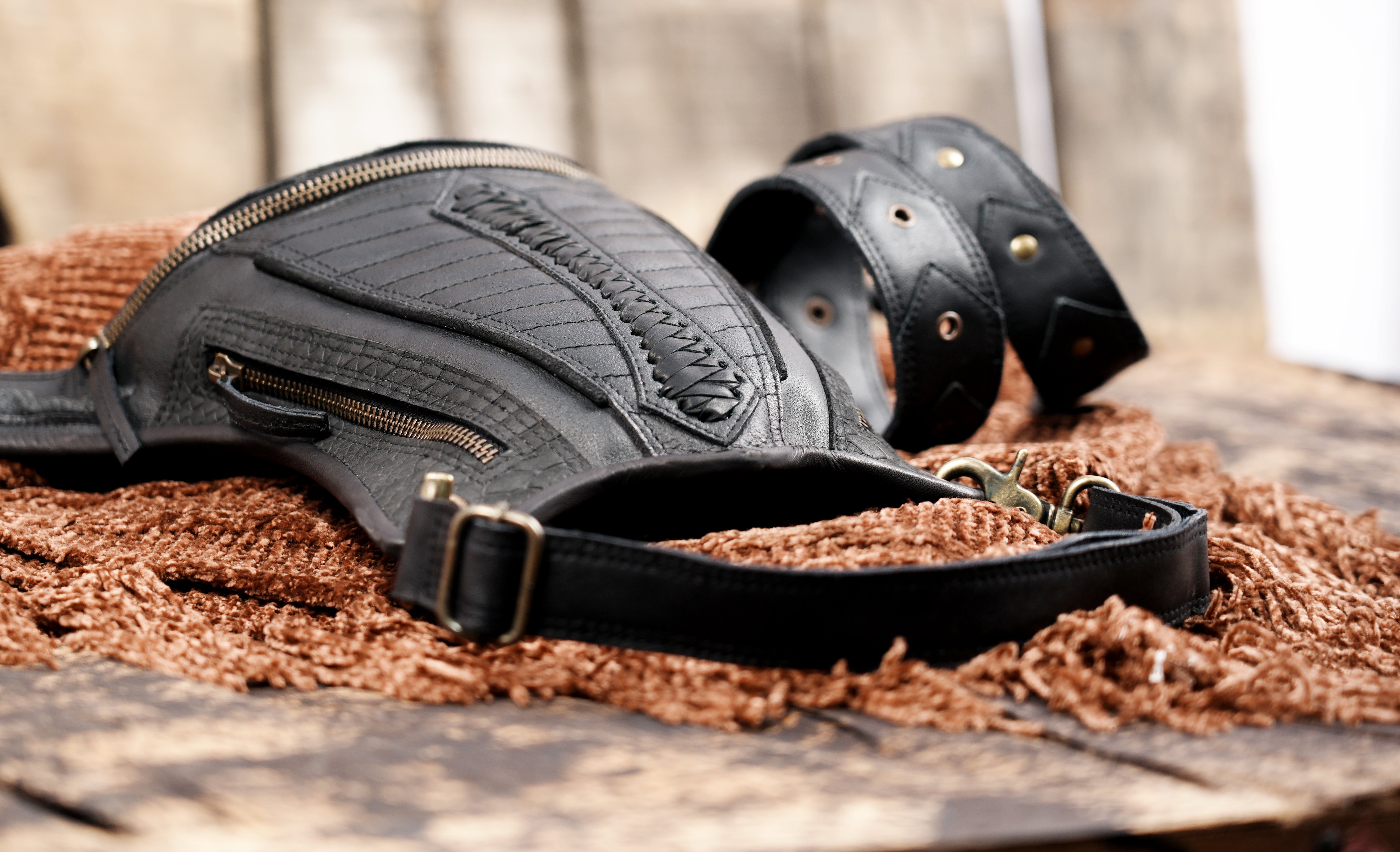 Black hip and thigh pouch with textured paneling