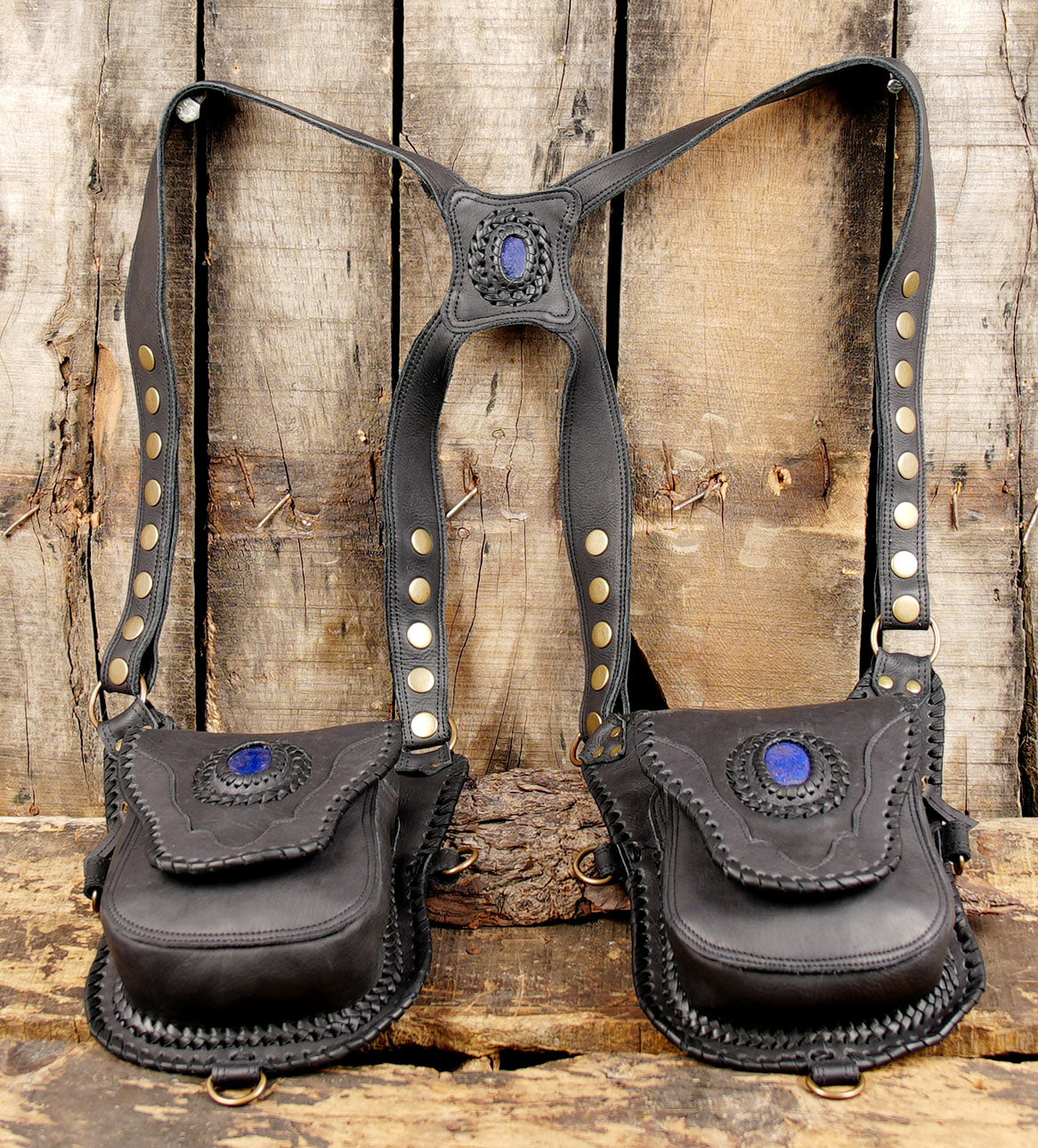 open leather holster bag showing pockets and compartments