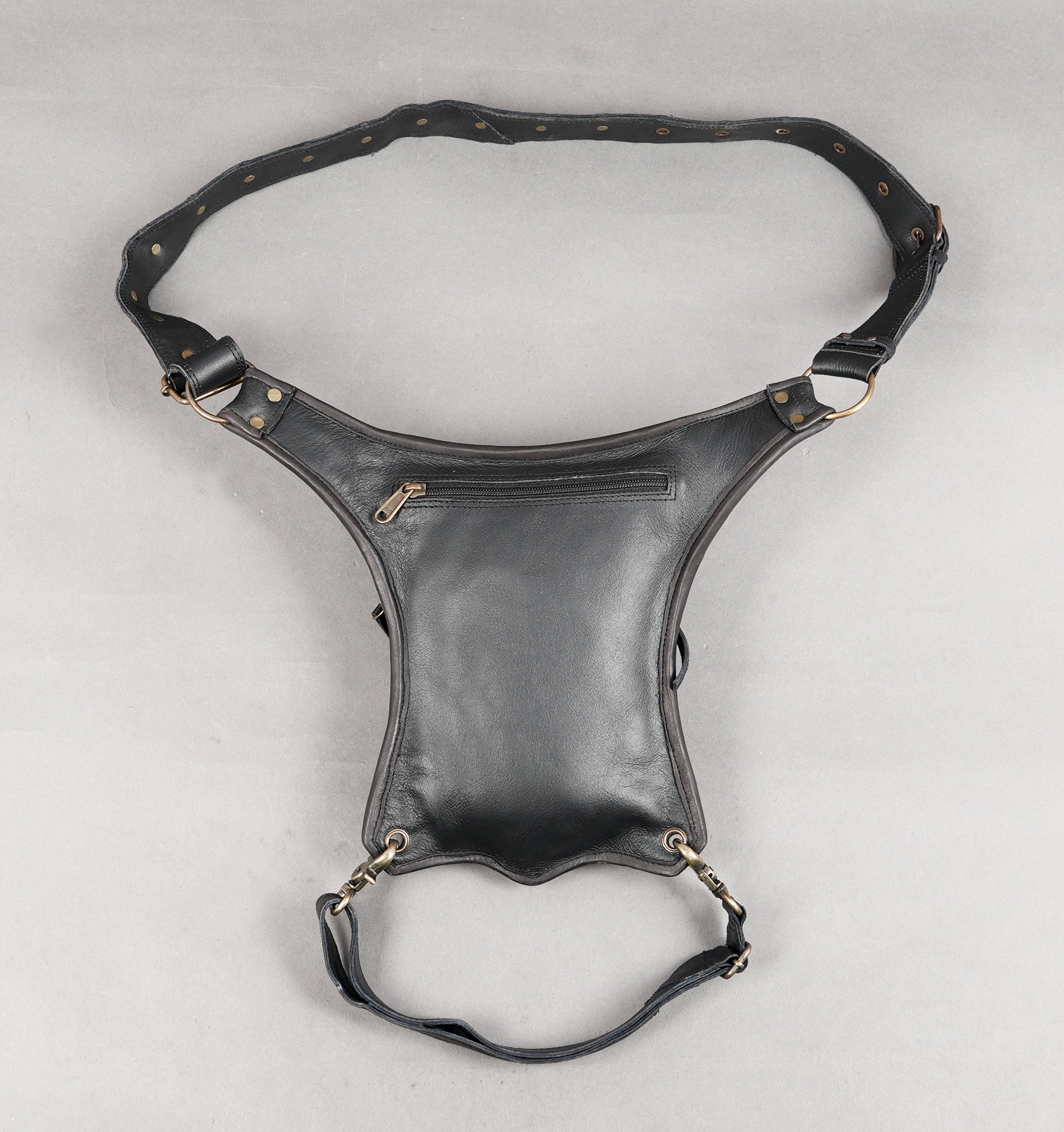 Utility leather thigh bag with secure zip closure