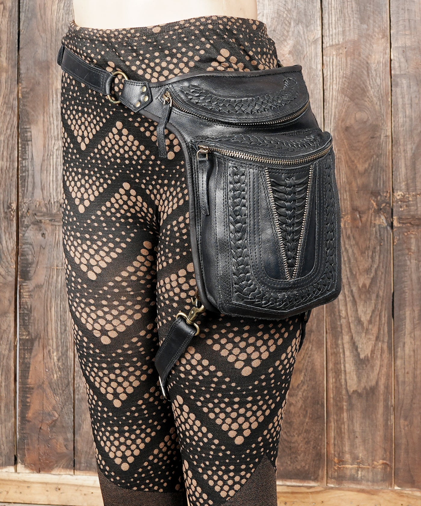 Black artisan holster bag with leg support strap