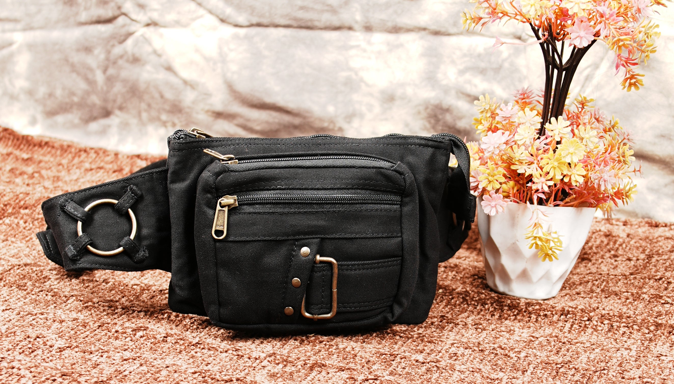 Black utility belt pack with organizer pockets and adjustable fit