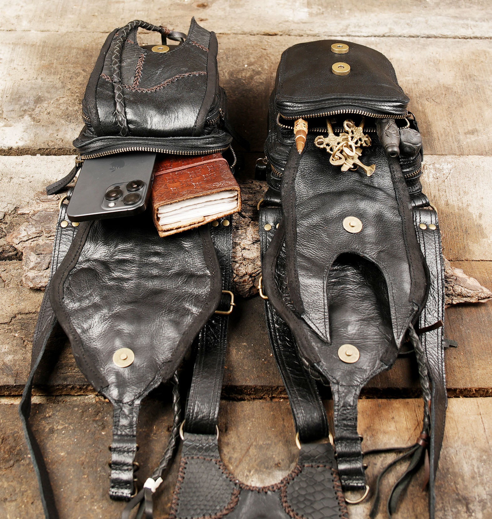 “Snake-pattern black leather holster with dual bags and brass hardware”