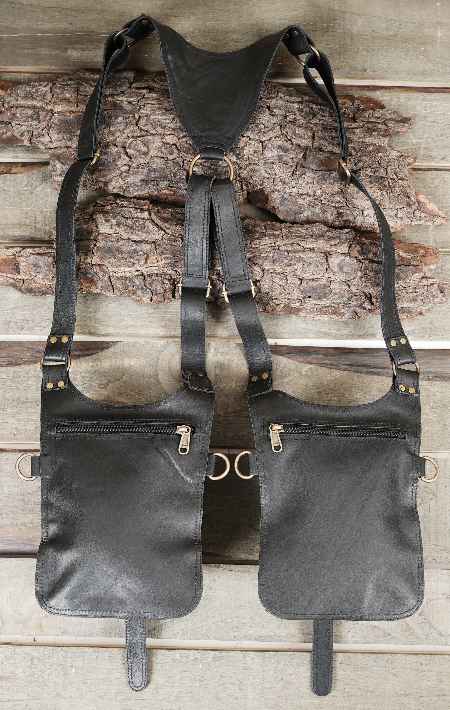 Leather harness holster with twin pouches for hands free carry