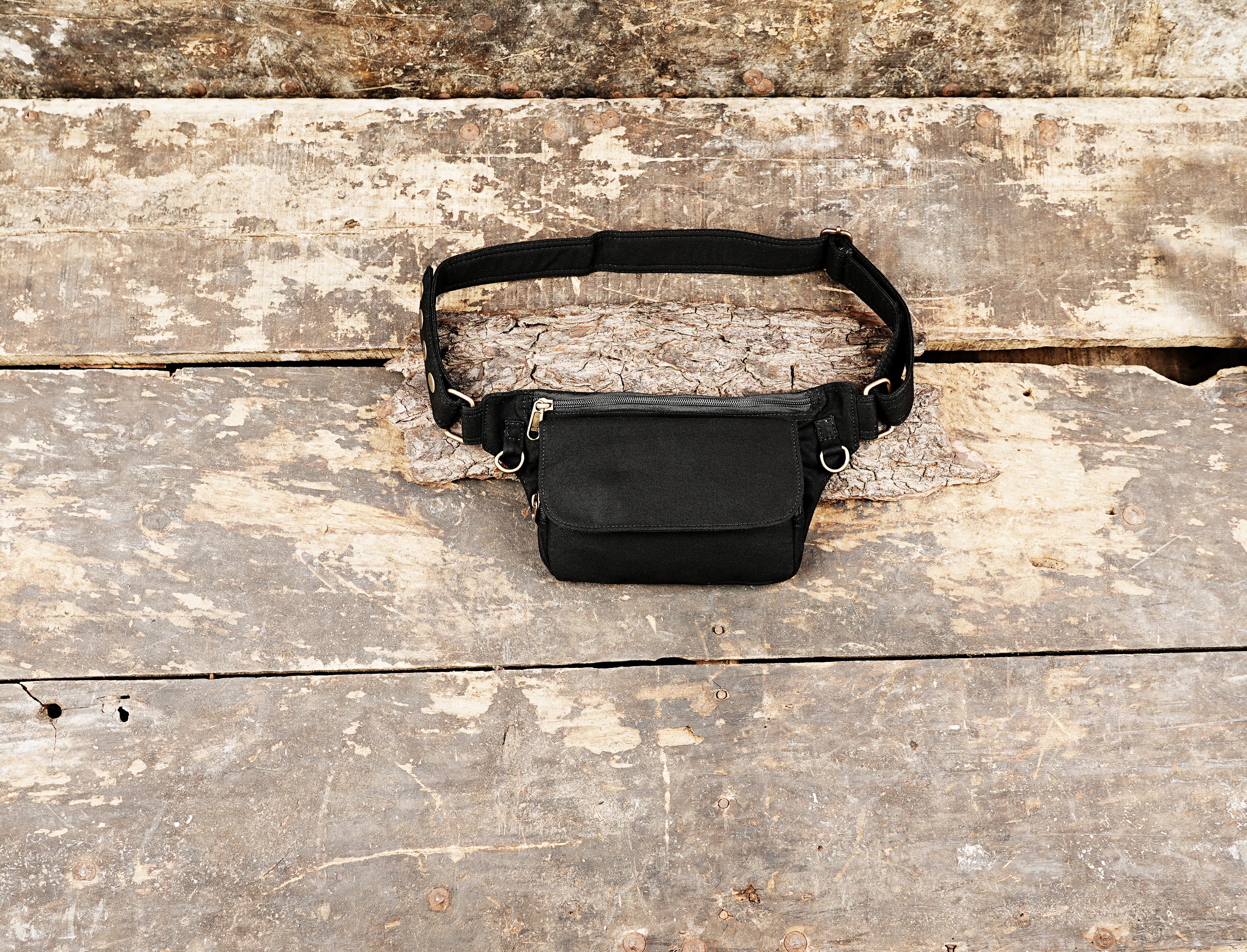Handmade black cotton waist pack for travel and hiking