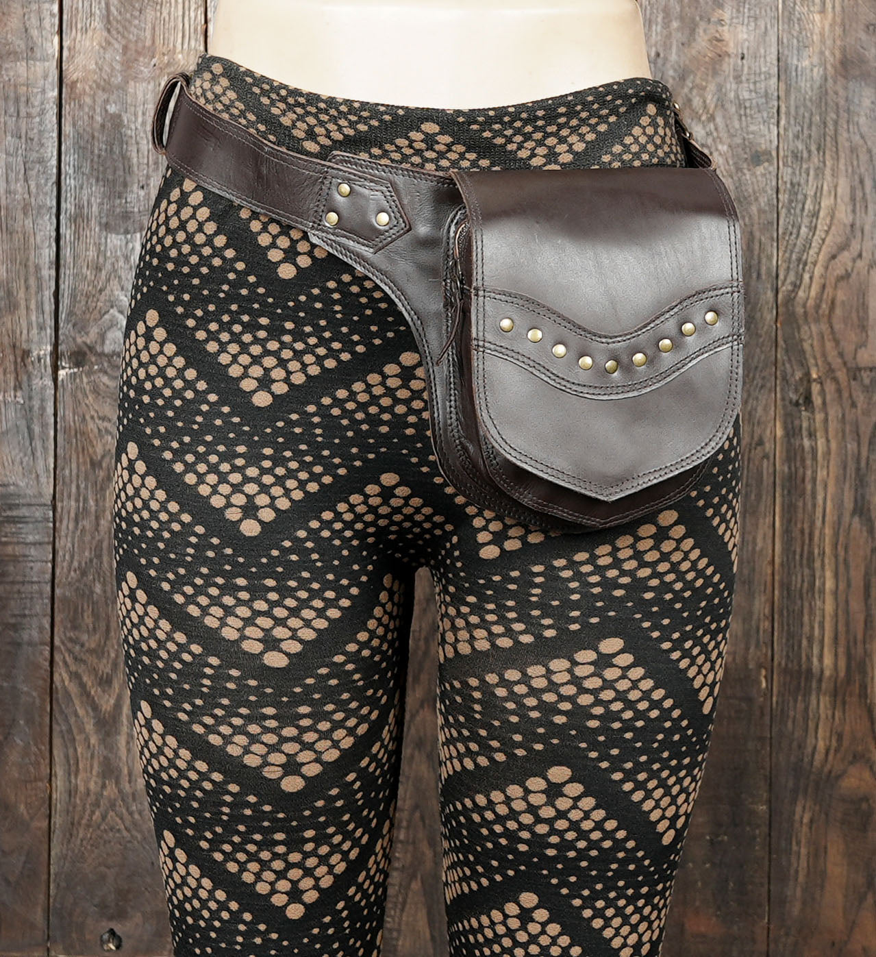 Rugged brown leather hip pouch with adjustable strap