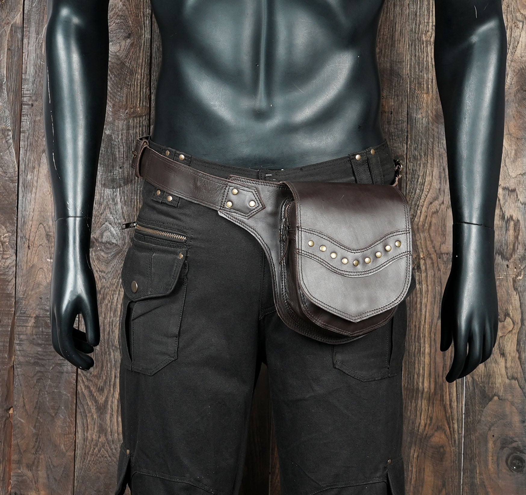 Brown leather utility waist bag with brass hardware