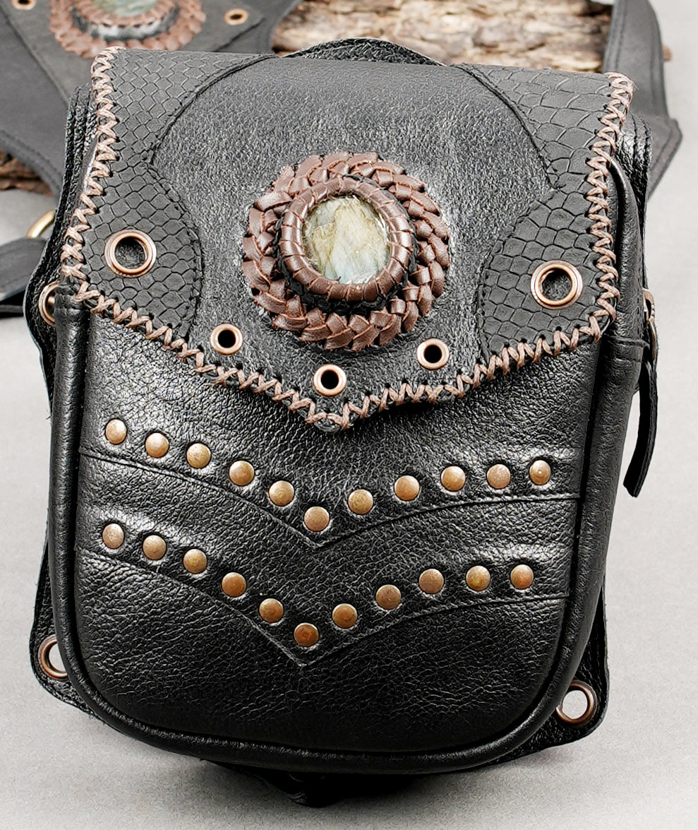 Black leather utility holster with dual pouches and strong hardware