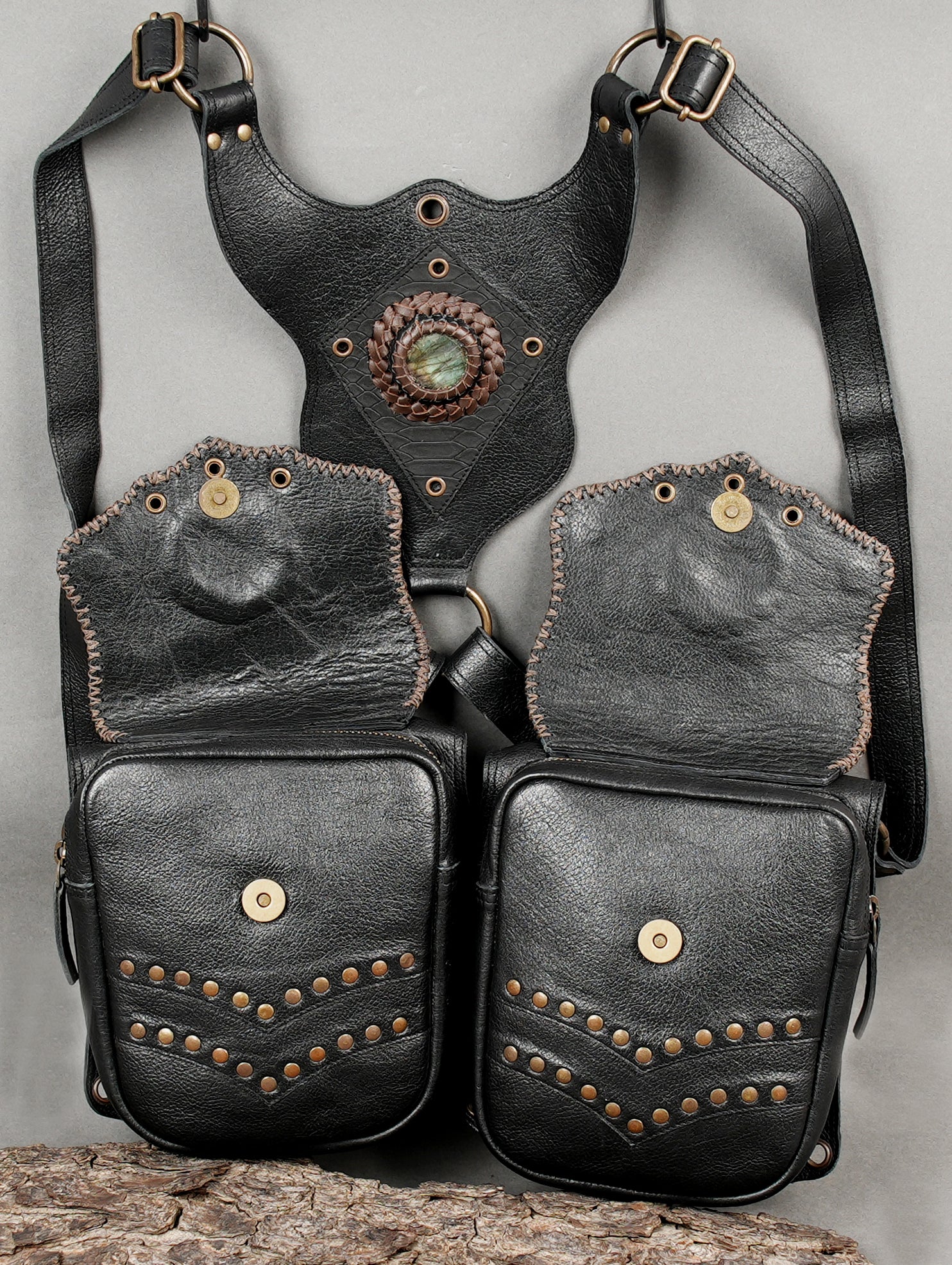 Handmade leather holster with rustic design and brass fittings