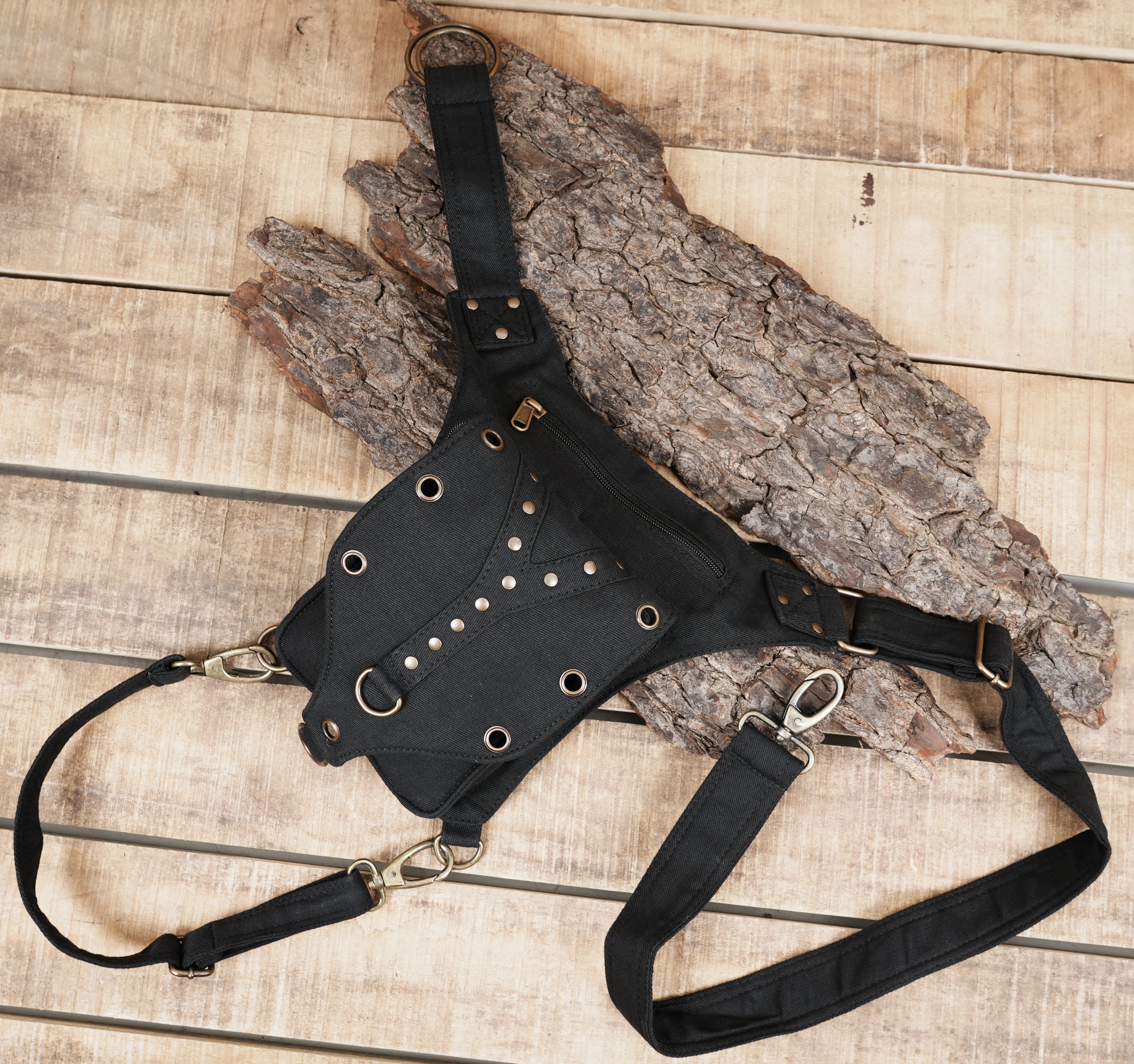 Utility hip pouch with adjustable waist and thigh straps
