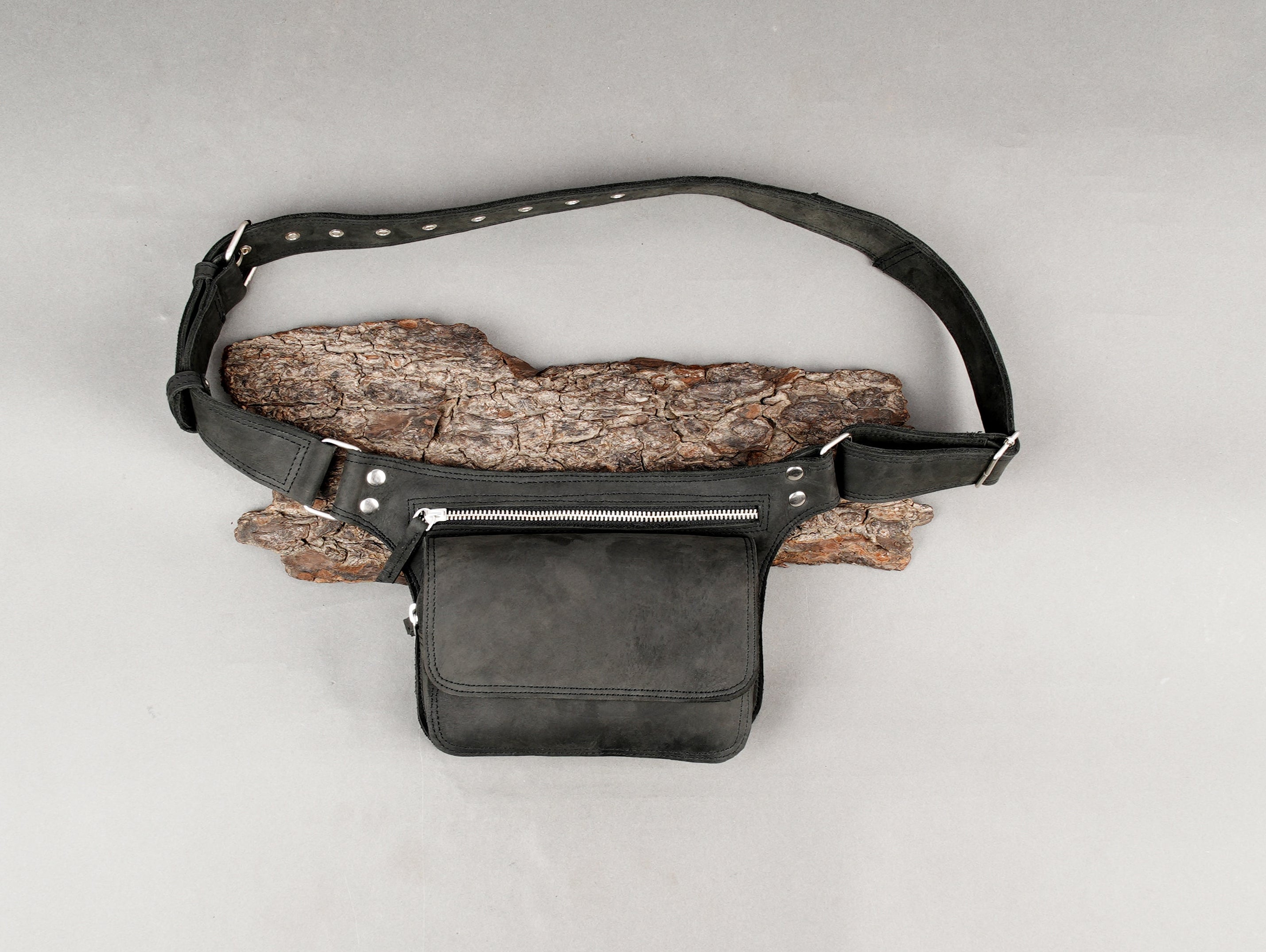Black leather waist belt with front utility pouch and zipper closure