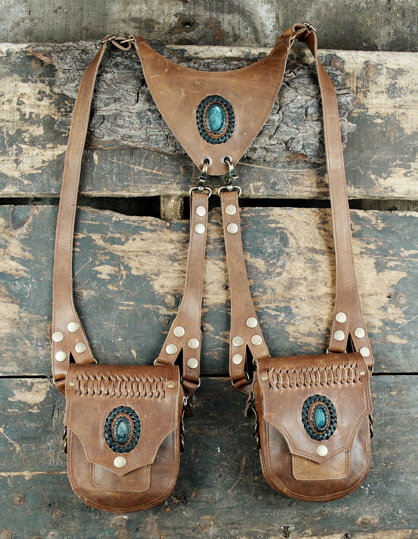 Artisan leather holster harness with braided brown details