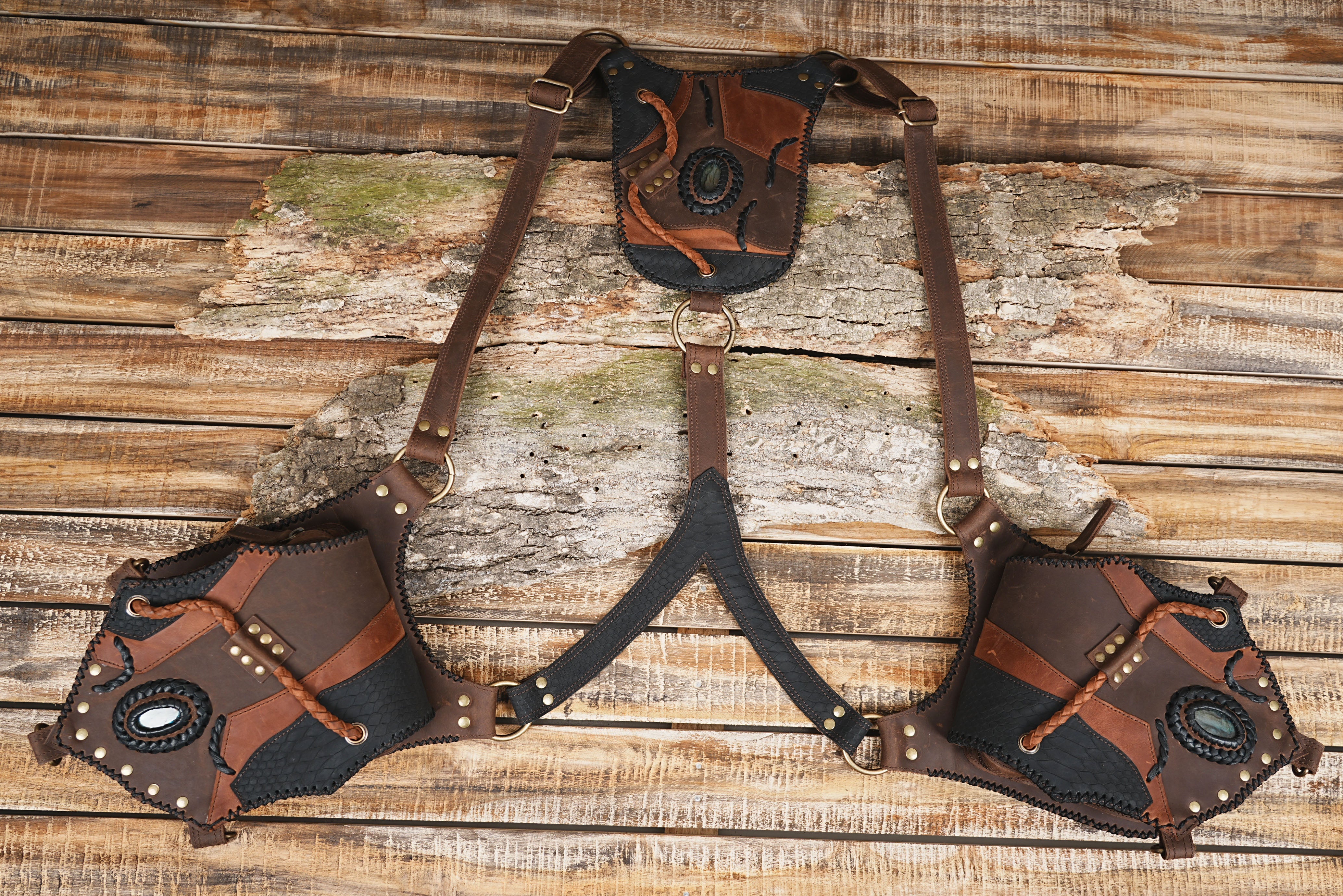 Steampunk costume leather harness with gemstone patch and strong rivets.