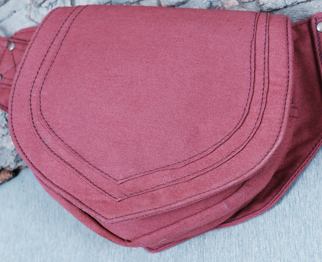 Durable canvas two-pocket hip bag for hands-free utility and travel.