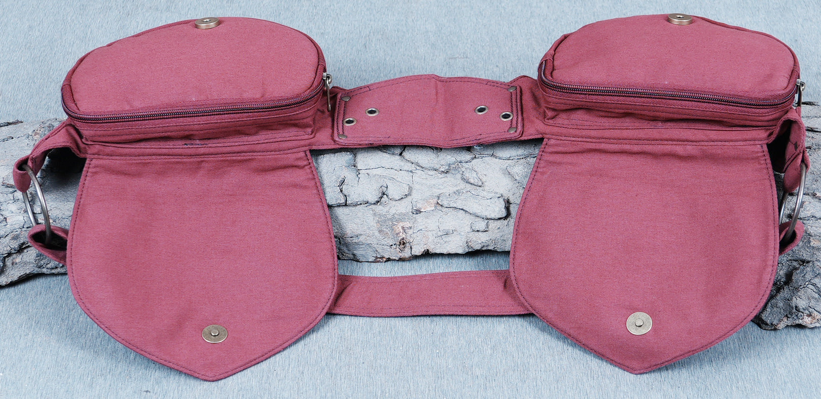 Bohemian style canvas fanny pack with a unique dual pouch design.
