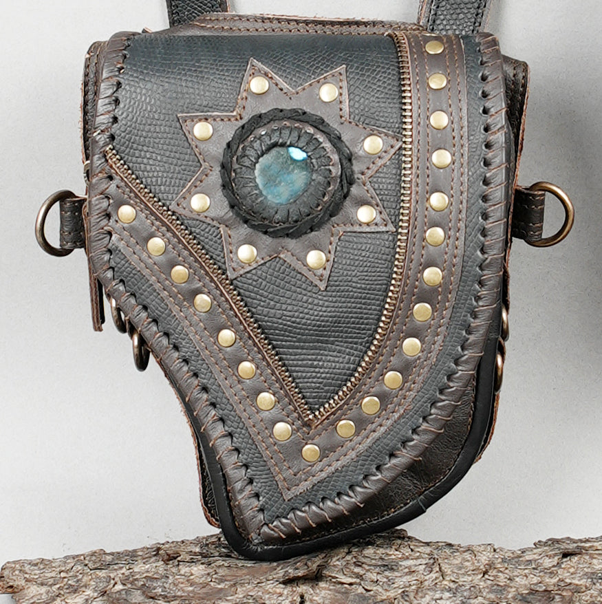 Adjustable leather shoulder holster with dual utility pouches