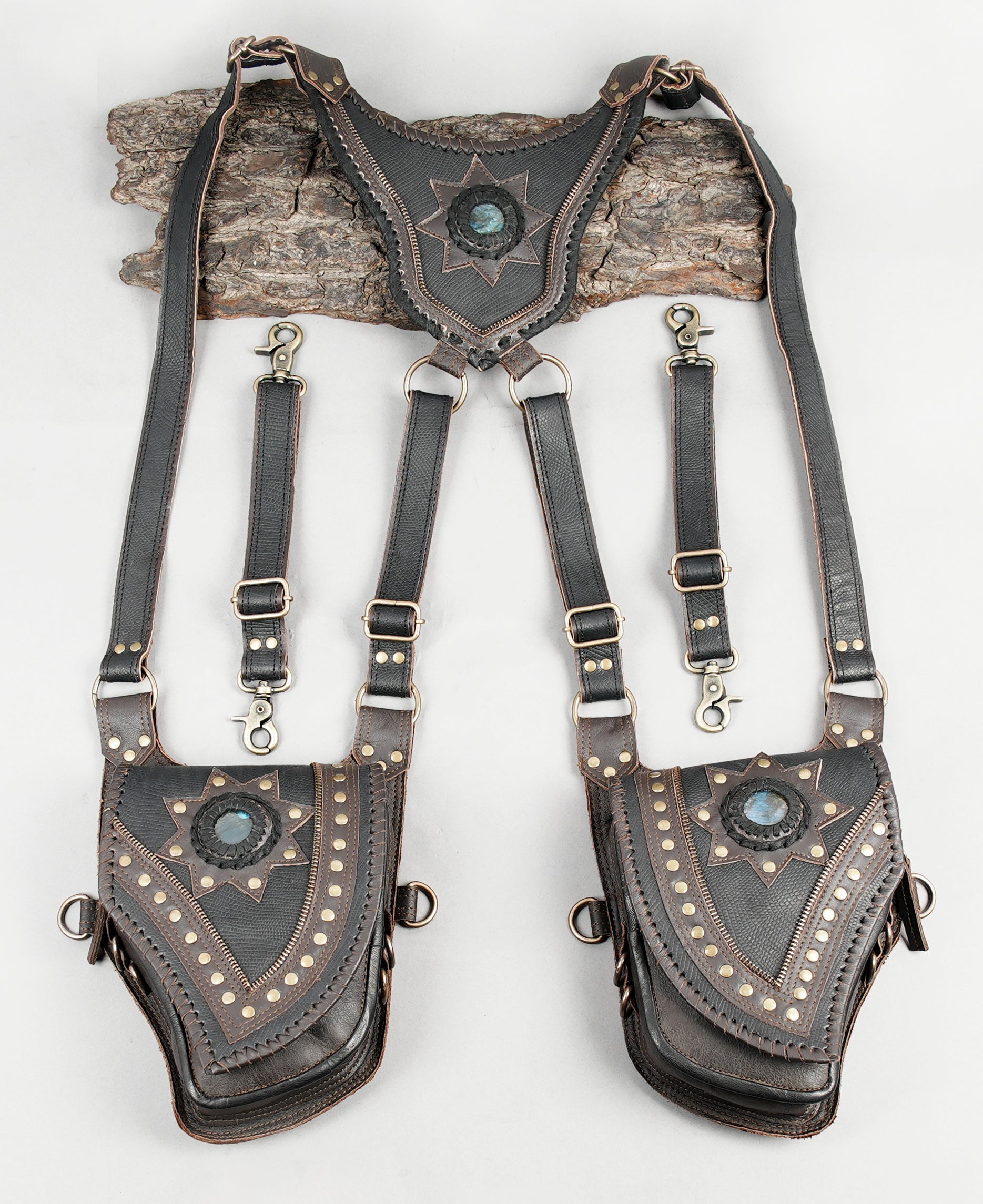 Handmade leather dual holster with gemstone star design and brass studs