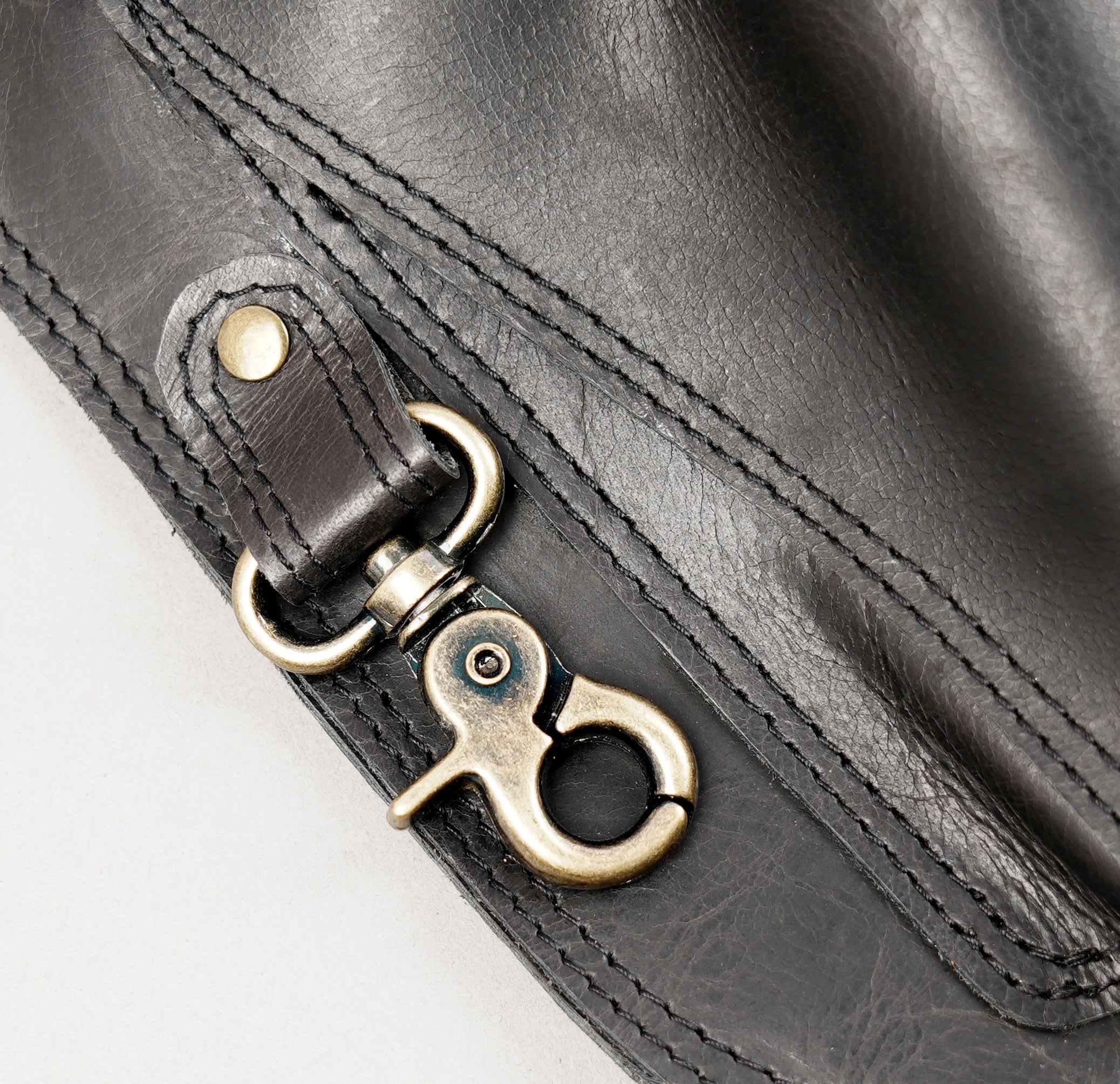 Adjustable leather holster for travel and outdoor use