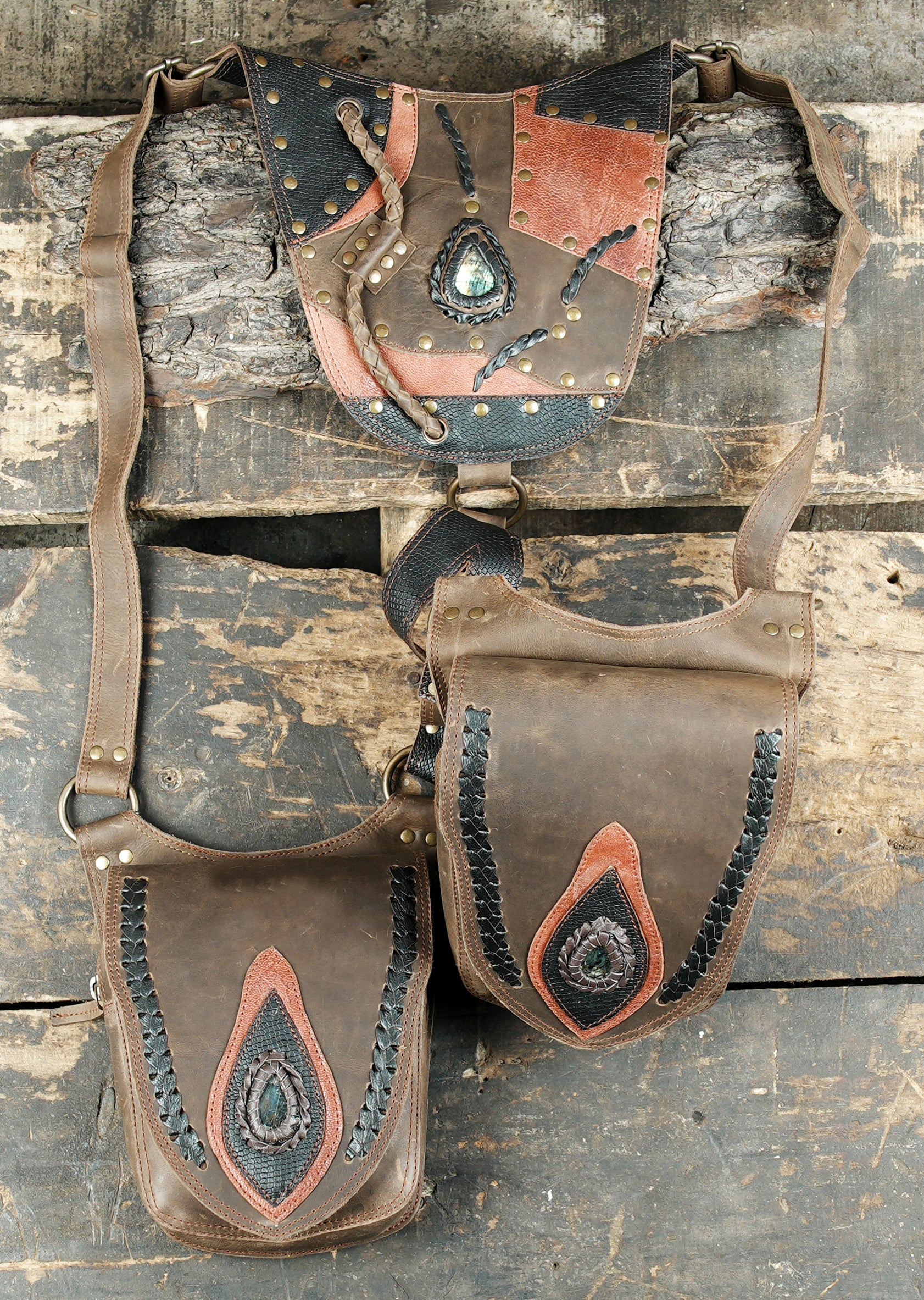 “Festival-ready patchwork leather holster with gemstone centerpiece”