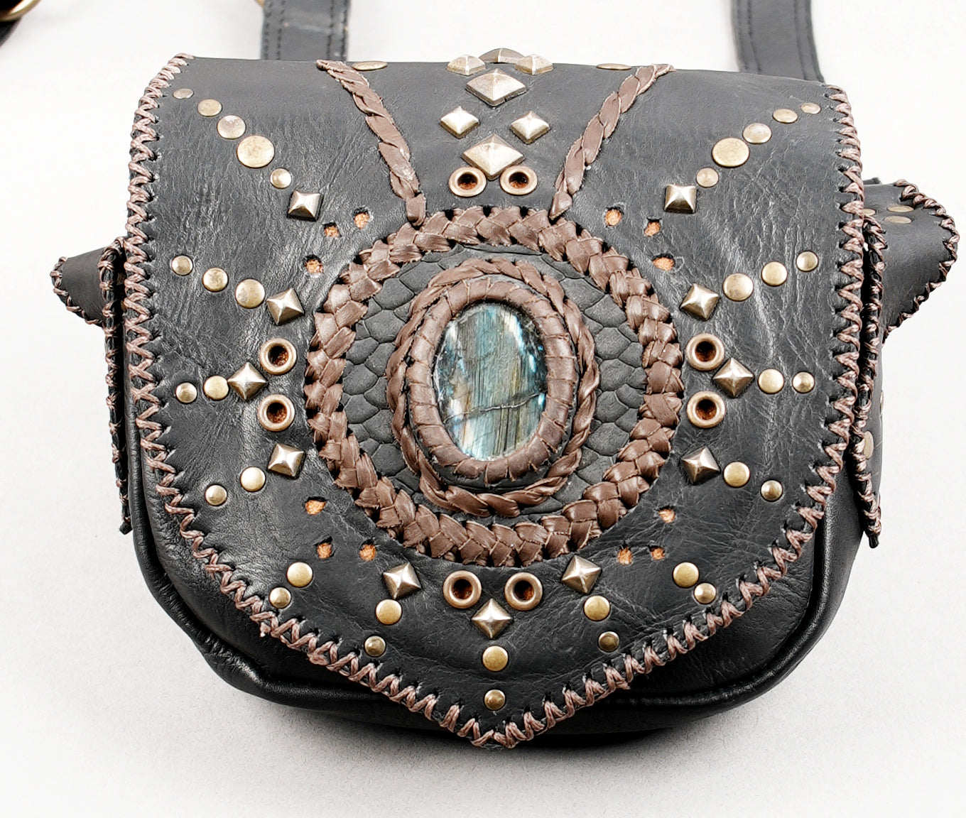 Decorative leather dual pouch holster with braided stitching design