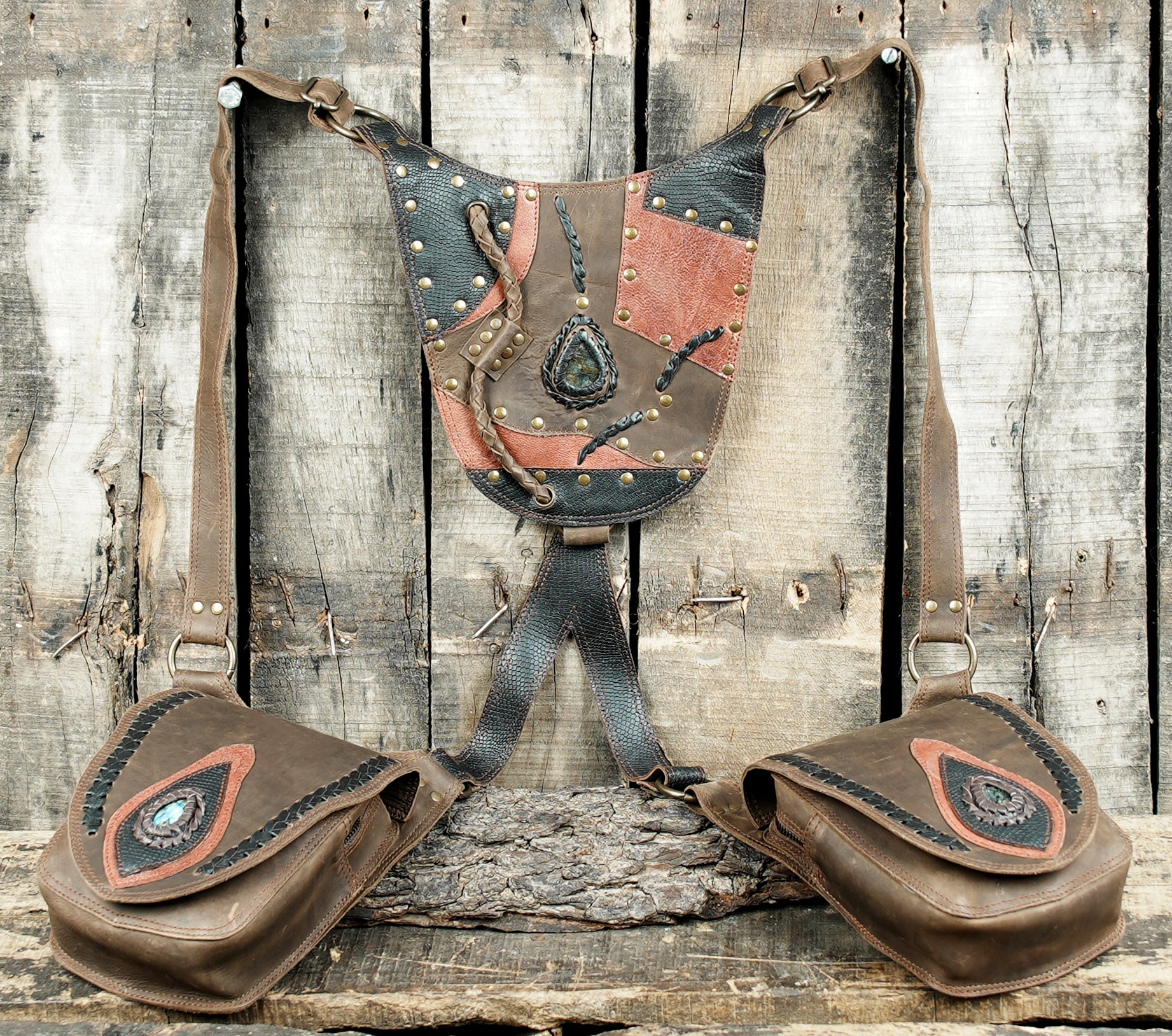 “Brown artisan leather utility holster with mixed leather textures and braided trim”