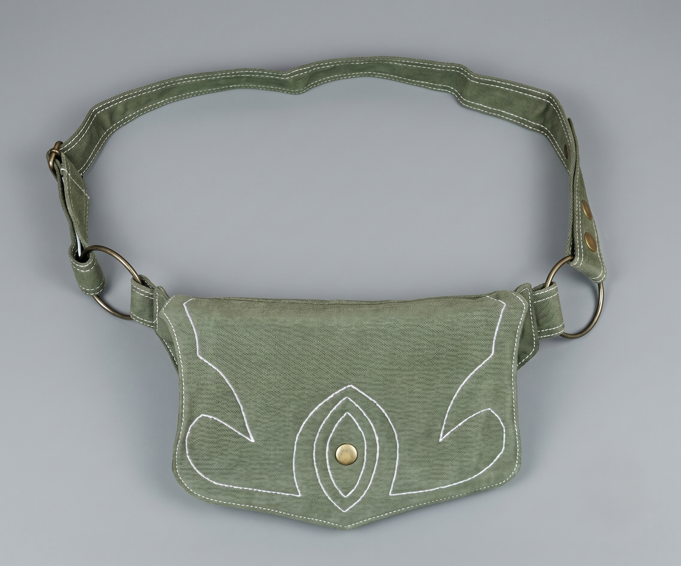Bohemian style bum bag with fire stitch pattern and brass snap button