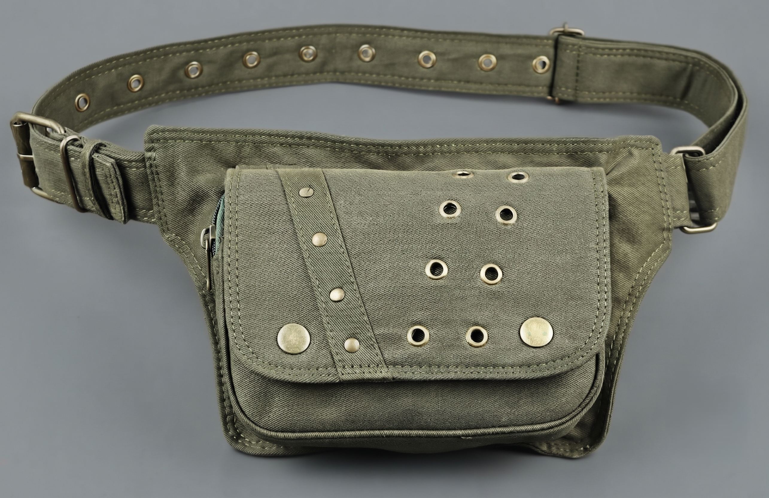 Rave-ready utility belt with one pocket and decorative metal eyelets.