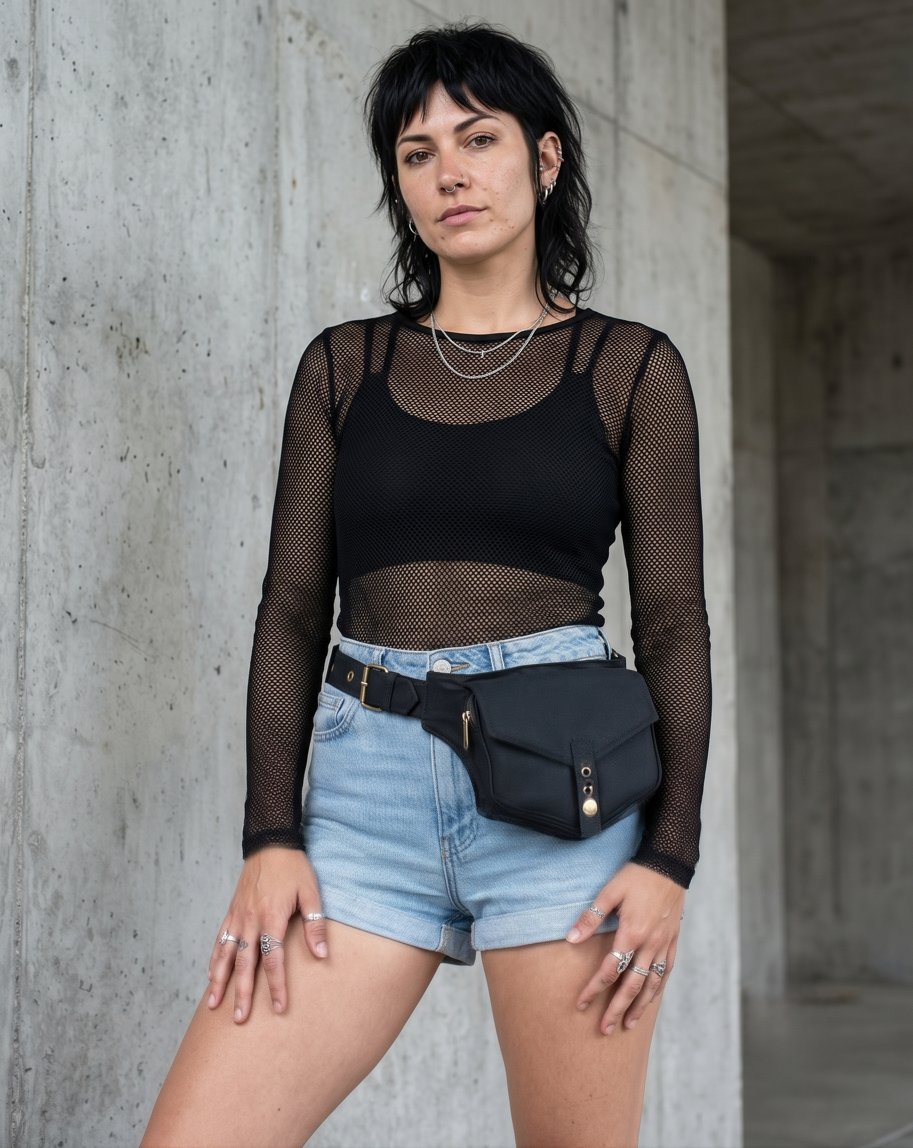Black cotton fanny pack with front flap pocket for festivals travel and outdoor use