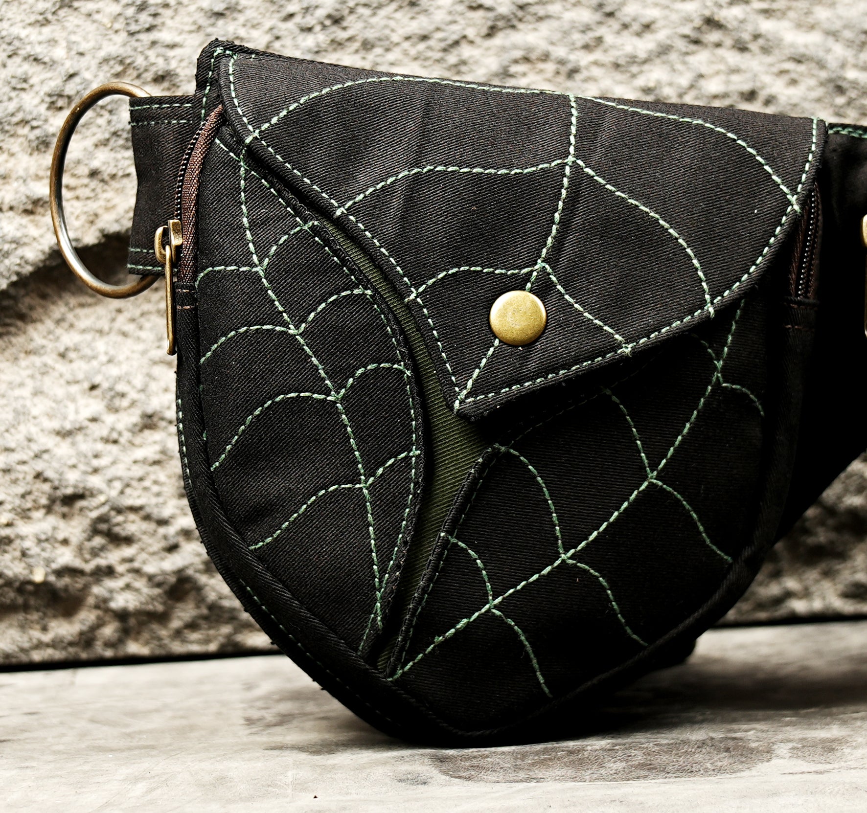 Psytrance festival waist pack belt in black cotton with green stitched leaf veins and dual pockets