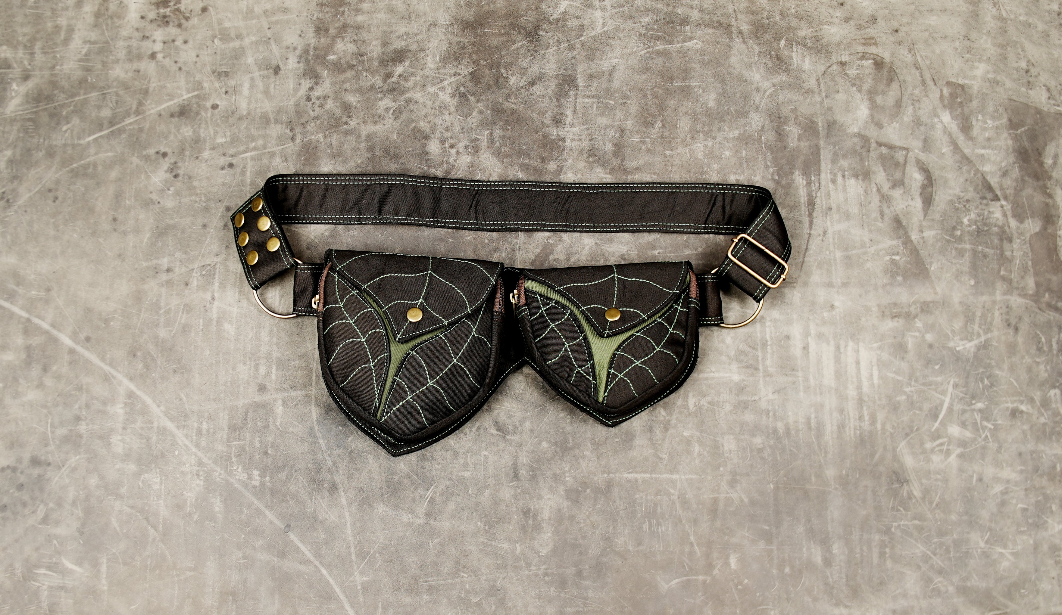 Handmade festival hip belt in black canvas with brown accents and adjustable brass buckle