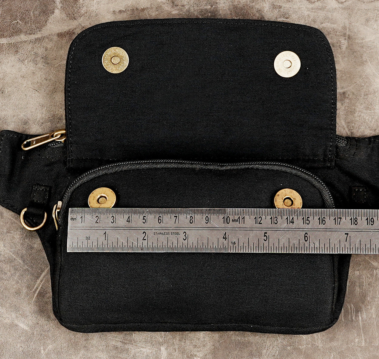 Black cotton utility hip bag with antique brass hardware