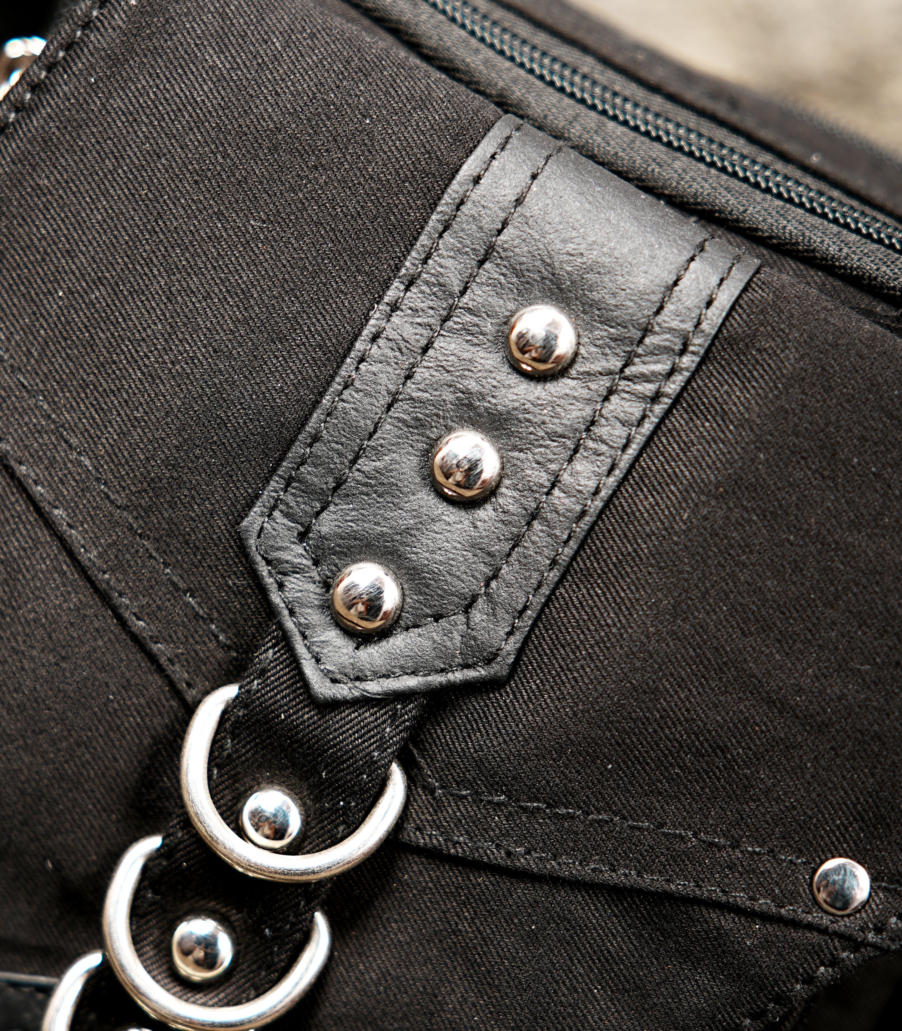 Black drop leg belt bag for phone, cards, and travel essentials