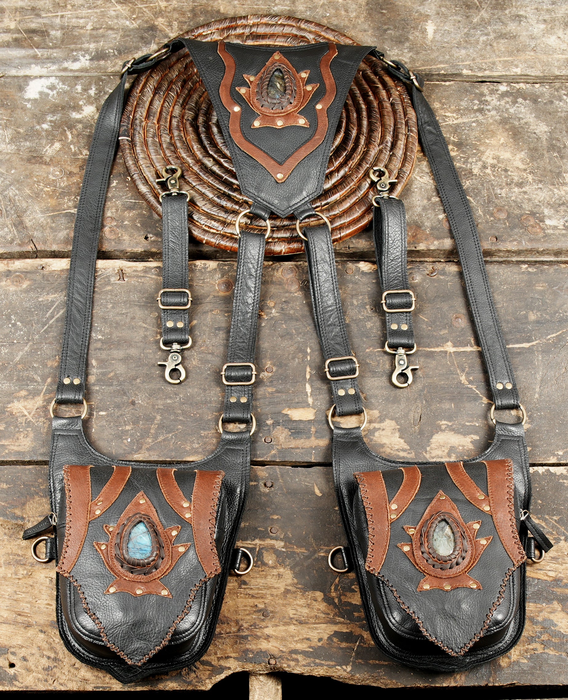 “White shoulder holster with gemstone centerpiece and detachable straps”